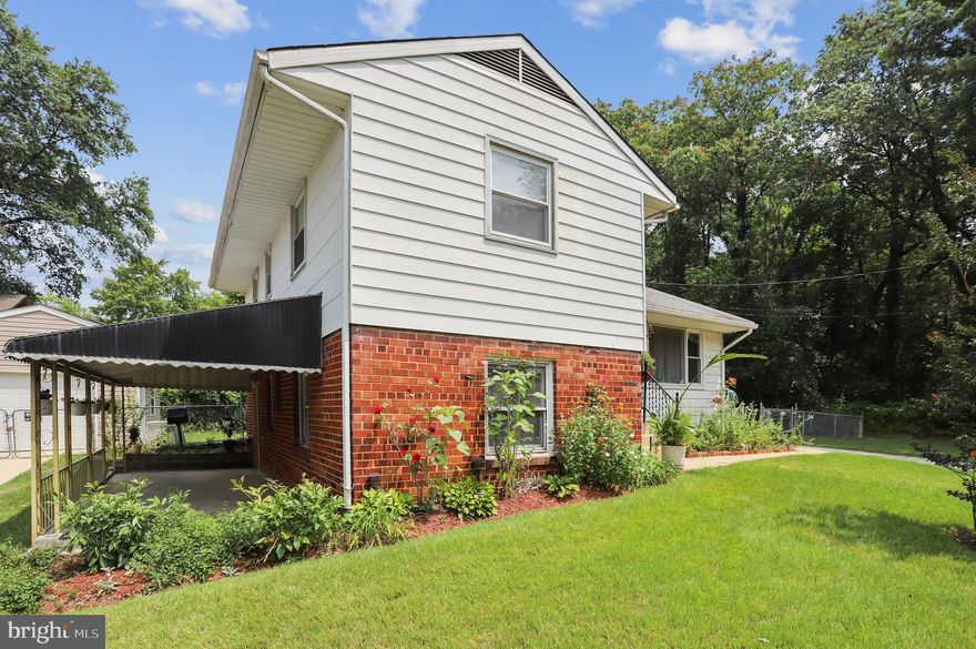 A well-kept gem in New Carrollton! Imagine living here at the end of the street with no additional thru traffic, with plenty of privacy. Located close to the community pool, park, shopping center's, which include grocery store's, coffee shop's, breakfast restaurant's and so much more! The New Carrollton Metro station, and Amtrak are less than 2 miles away. Have an easy commute to DC and Annapolis with the Capital Beltway (495), and John Hanson Hwy (Rt 50) only an exit away. Features include an office, two full baths, laundry/utility room with a private entrance, 2 bedrooms with double closets. The main level includes an open concept living room with an attached dining and breakfast room, kitchen with breakfast bar. Hardwood floors throughout. An additional side door on the main level that leads to a patio that backs up to trees. A fully fenced backyard that includes a shed/workshop that has electricity. That is in addition to the side patio that is covered to watch the sunset. But do not worry about parking, because there is a two-car driveway and ample street parking. So, come see where you can possibly live! Although, this property has been well kept it is being sold "as is".