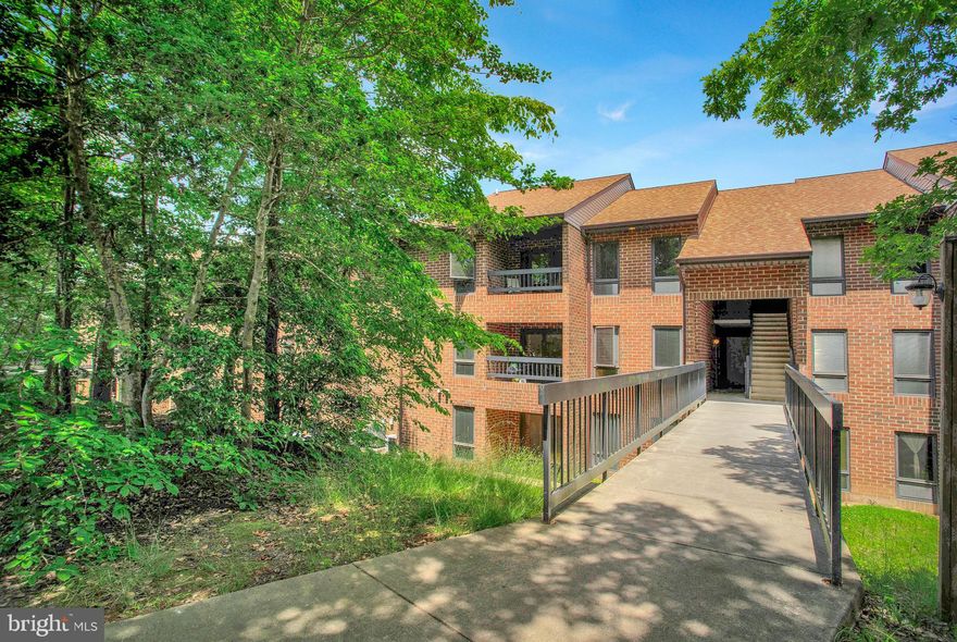 Ultra convenient, MAIN ENTRY LEVEL (no steps) condo with rear-facing patio that offers a private and peaceful view of the tree line. New carpet and fresh paint. Galley kitchen with open view of the living and dining area. Full bathroom with laundry room/storage access. Trash and water/sewer bill are included on the condo dues. Per seller, this unit also allows access to the Wildewood Apartments pool, gym, carwash, and BBQ area.