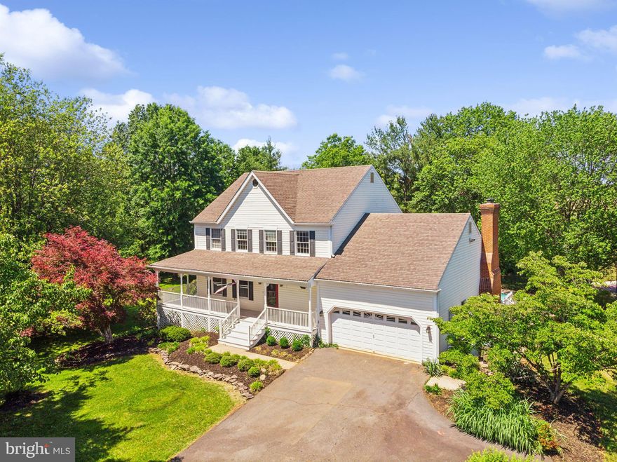 Tucked away in the tranquil English Meadows community, this spacious 3,672 total square-foot home sits proudly on just over an acre of beautifully private, tree-lined grounds—your own personal sanctuary filled with space, sun, and so many ways to enjoy home life to the fullest.

From the moment you arrive, the setting invites you in. The lush backyard opens to a stunning in-ground, kidney-shaped pool, perfect for long summer days or peaceful morning swims. Just beyond, a lighted sport court offers boundless opportunities for tennis, pickleball, basketball—or whatever the moment inspires. With wide open lawn space to spare, it’s a dream for backyard barbecues, lawn games, and making memories.

Inside, the home is equally generous, with light-filled rooms and a layout designed for both entertaining and everyday comfort. The main level welcomes you with warm hardwood floors, handsome dentil mouldings, and elegant chair rail details in the formal dining and living rooms. At the heart of the home lies a custom-designed kitchen, anchored by a large center island and surrounded by granite countertops, abundant cabinetry, and a wall of windows that frames sweeping views of the backyard. A bright breakfast nook with a charming bay window opens into the vaulted family room, where skylights, a dramatic floor-to-ceiling stone fireplace, and French doors to the back deck create a cozy yet open gathering space.

Upstairs, the home offers three large bedrooms and two and a half baths. The secondary bedrooms each feature ceiling fans and walk-in closets, while the oversized primary suite is a true retreat, complete with dual walk-ins and a serene ensuite bath with a jetted tub, separate walk-in shower, double vanity, and more sunlight courtesy of the skylight and backyard-facing window.

The finished walk-out lower level expands your lifestyle even further, offering flexible space for hobbies, workouts, movie nights, or a future game room. A large utility room also provides ample storage, keeping the rest of the home organized and open.

This property invites you to stretch out, settle in, and create the life you’ve always imagined—all without ever needing to leave your own backyard. Whether you're hosting friends poolside, shooting hoops under the stars, or enjoying quiet mornings with coffee and birdsong, this is a home where the possibilities truly feel endless.

Come see how this special home in English Meadows could be your next chapter.