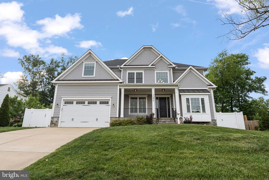 Welcome to 7606 Leonard Drive, an exceptional five-bedroom, five-bathroom residence gracefully situated in the highly desirable Pimmit Hills community. Built in 2019 and offering over 6,300 square feet of meticulously designed living space, this home seamlessly blends refined elegance with everyday comfort in one of Northern Virginia’s most connected locations.

From the moment you enter, you’re greeted by soaring ceilings, rich hardwood flooring, and custom millwork that elevate the home's modern Craftsman aesthetic. The gourmet kitchen is the centerpiece — a striking blend of form and function — featuring professional-grade stainless steel appliances, a six-burner range, an oversized island with bar seating, and expansive quartz countertops that invite culinary creativity and effortless entertaining.

The main living spaces are bright and airy, flowing effortlessly from the formal dining area to the expansive family room adorned with custom built-ins and a cozy fireplace. A thoughtfully designed floor plan allows for both grand-scale entertaining and intimate gatherings, while large windows frame views of the landscaped backyard.

Upstairs, the serene primary suite is a retreat of its own, offering a spa-like en-suite bath with a soaking tub, dual vanities, and a walk-in shower. Additional bedrooms are generously sized with ample closet space and private or adjoining baths, ensuring comfort for family and guests. The fully finished lower level expands the lifestyle possibilities, with space for a home theater, gym, or recreation room tailored to your needs.

Outside, a lush and private yard provides the perfect setting for alfresco dining, weekend barbecues, or simply enjoying a quiet evening under the stars. Set on a 10,000+ square foot lot, the home offers both space and seclusion just minutes from Tysons Corner, downtown McLean, and major commuter routes.

This is luxury living reimagined—where timeless design meets modern convenience, in a location that places the best of Northern Virginia at your doorstep.