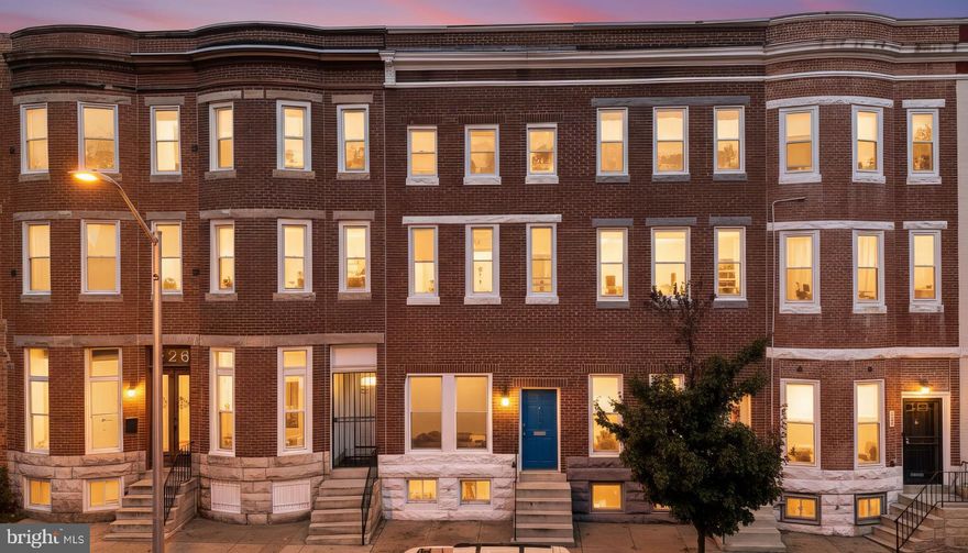 This 4-bedroom, 2.5-bath interior row/townhouse in Baltimore’s Reservoir Hill neighborhood offers 2,385 square feet of finished living space across three levels. Built in 1907 and renovated with contemporary finishes, the home features hardwood flooring, tray ceilings, and an open-concept main level that includes a living and dining area, half bath, and laundry room.
The kitchen is equipped with granite countertops, a herringbone-pattern subway tile backsplash, and stainless steel appliances. Upstairs, the larger of two bedrooms includes a walk-in closet, and there is a full bath with soaking tub and separate shower. Two additional bedrooms and a second full bath are located on the third level.
Additional highlights include zoned central air, electric heating and hot water, an unfinished basement providing 855 square feet of storage, and two-car off-street parking. 
Conveniently located near the MARC Train, Light Rail, Penn Station, I-83, MICA, and the University of Baltimore, this home offers easy access to city amenities.