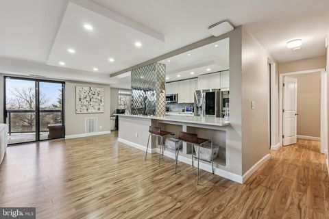 Photo of 8380 Greensboro Dr #118, MCLEAN, VA 22102 (MLS # VAFX2300582)