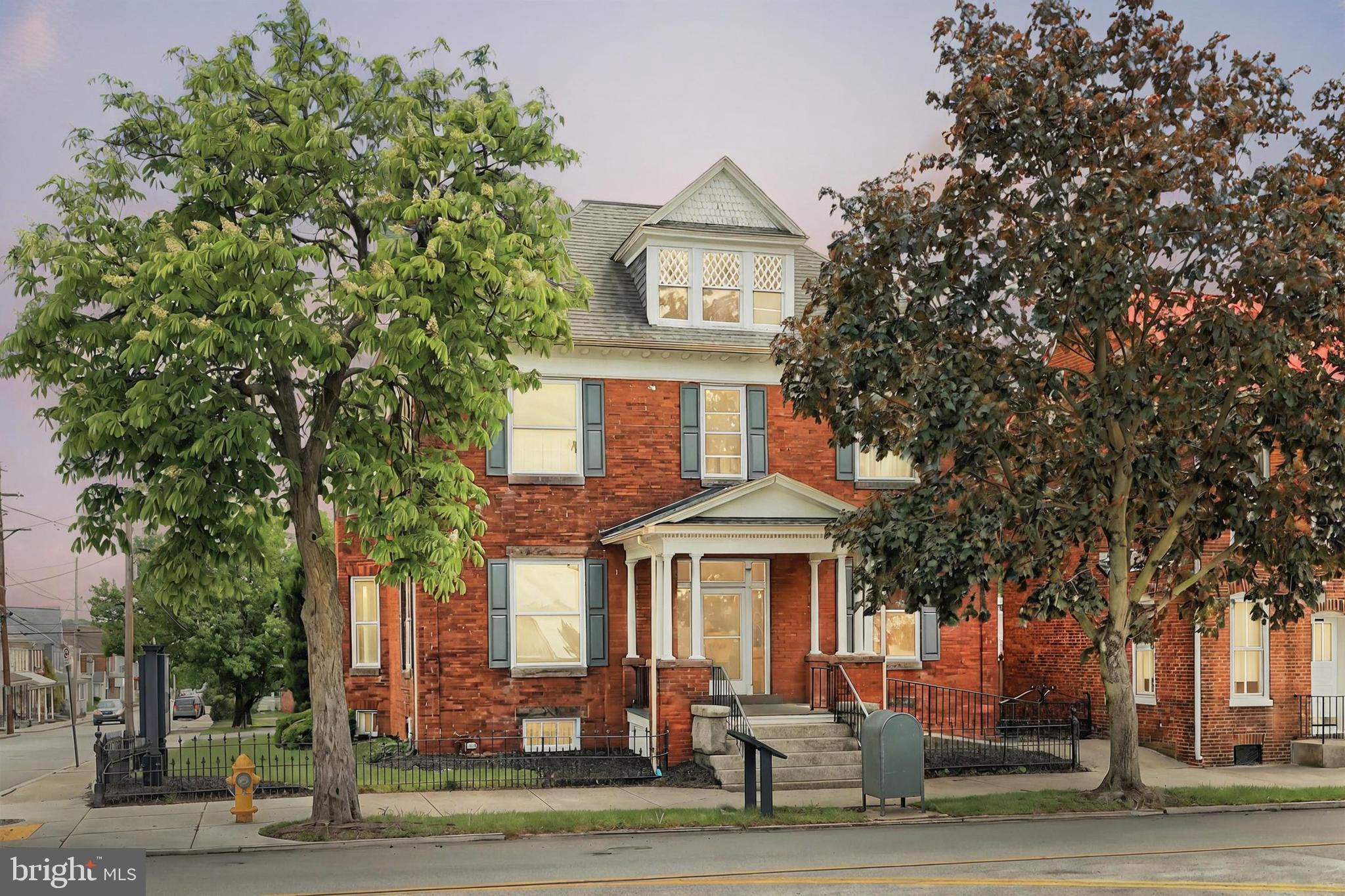 Welcome to 335 Broadway, in the heart of Hanover's beautiful downtown! This Mixed Use zoning, all brick 2 story is currently set up as a turn key dental office, with a potential 2 Bedroom apartment on the 2nd floor. The office features 4 exam rooms, 2 half baths, a lobby and reception desk. Currently offering 14 paved parking spaces, the lot goes all the way to the alley and could offer even more parking spaces. The mixed use zoning and ideal corner location makes this the perfect home for small medical or professional office user. The 2nd floor apartment is beautiful with chestnut woodwork and views of town. There's a huge attic above that could offer even more square footage.!