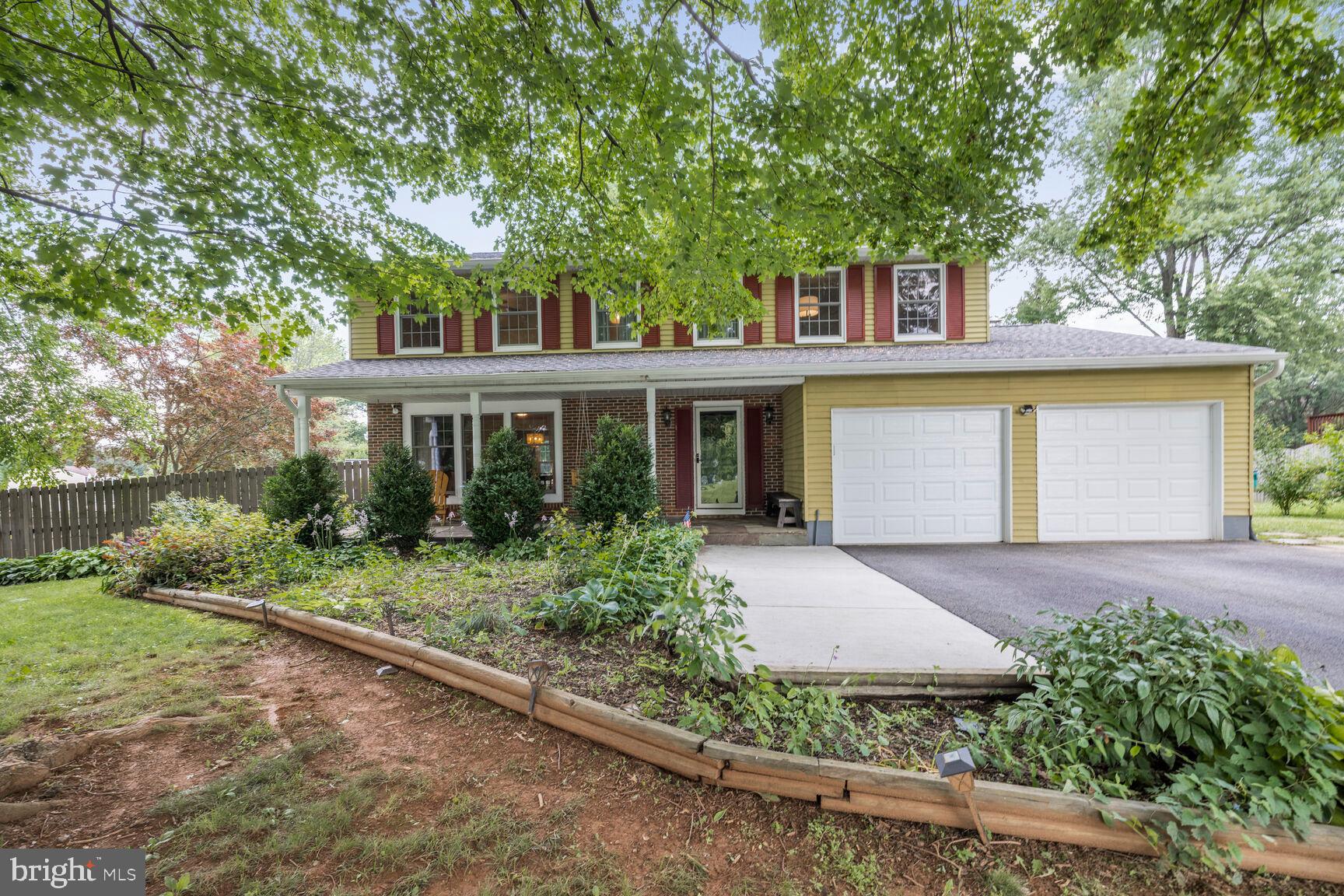 Stunning 4-bed, 3.5-bath single-family home ideally located just minutes from Downtown Middletown. Set on a generous 15,000 sq. ft. corner lot with peaceful tree-lined views, this residence boasts numerous enhancements inside and out. Step inside to upgraded flooring and sophisticated finishes throughout. The inviting living room showcases custom built-ins with shelving and storage, while the dining area is adorned with classic wainscoting and elegant lighting. The kitchen is a chef’s dream, equipped with custom cabinetry, granite countertops, a stylish stone backsplash, recessed lighting, and stainless steel appliances—including a newer refrigerator, dishwasher, and microwave (2022–2024). Adjacent to the kitchen, the expansive family room is perfect for entertaining, featuring a cozy wood-burning fireplace and French doors that open to a stone patio overlooking the tranquil backyard. A convenient powder room completes the main level. Upstairs, retreat to the spacious owner’s suite with custom accent wall, walk-in closet, and a recently renovated luxurious en-suite bath (2024). This spa-like bathroom offers a dual-sink vanity and an oversized walk-in shower with a built-in bench, body jets, and three shower heads—including an overhead rainfall system—designed for ultimate relaxation. Three additional bedrooms share a modern full bath with tub/shower combo and updated wall and floor tiles. The lower level provides flexible living space, featuring a large rec room with a wet bar, a potential 5th bedroom, full bath with stand-up shower, and laundry area with ample storage—ideal for an in-law suite, home office, gym, or play area. Step outside and enjoy your private oasis, complete with a stone patio, hot tub, outdoor string lights, storage shed, and a flat, fully fenced yard for everyone to enjoy! The attached two-car garage and driveway offer off-street parking for up to four vehicles. Other recent improvements include newer HVAC (2023), water heater (2022), and roof (approx. 2019). No HOA fees! Ideally situated near Middletown Park with sports fields, trails, and pond, Middletown Library, and all the dining and shopping that Downtown Middletown and Frederick have to offer!