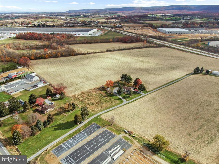 Close to I81 and Route 11.  Population over 20,000 within 3 miles. Constant and increasing growth area.  Shippensburg University also adds over 6000 students. Zoned Highway Industrial Commercial, 1.5 acres currently has a 3 bedroom, 2 bath Split Level that could be immediately occupied. The property sits behind another property currently listed as well (8750 Olde Scotland Rd, Shippensburg, also with a home, rancher, 3 bedroom, 2 bath with immediate occupancy available) Both properties would total just over 3 acres all zoned Highway Industrial Commercial. Less than 1 mile off of I81 on exit 24, sitting between 7 current warehouses in a continued growth area. Heavy Traffic count daily.