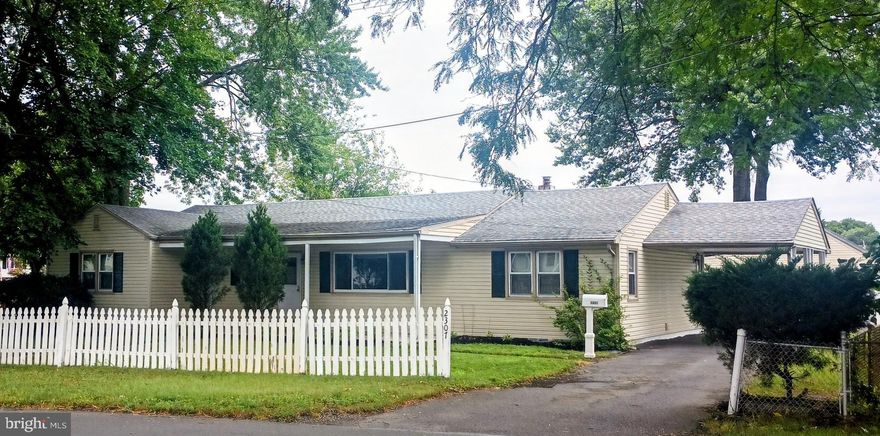 Beautiful Ranch featuring 3 Bedrooms and 3 FULL Bathrooms.  Enter front of home into living room with beamed ceilings, large window to leave in natural light, berber carpeting  and open floor space.  Hallway with 2 closets and full bathroom leads to 2 bedrooms, one being the master with walk in closet and full bathroom including jetted bathtub.  Both bedrooms are a nice size and freshly painted.  Kitchen features solid wood cabinetry  and stainless steel appliances, ceramic tile floor and sliding doors to the backyard.  Next to kitchen is laundry/mud room that has access to the basement and door to the backyard and driveway.  3rd bedroom and the 3rd Full Bathroom is located off of laundry/mudroom (could possibly be used as in-law suite). Roof and hot water heater replaced 2019.  There is a large driveway and a carport on side of house.  Additional parking behind the house that would fit 10 plus vehicles AND a  3 car detached garage.  Above the right side of garage there is upstairs storage .  There is a small bathroom in garage as well, water was turned off at its shutoff in front of garage.  2car garage measures 23x19 the single side 23x18. Great garage for contractors, mechanic, car enthusiast, or as a workshop.  Close to PA & NJ Turnpikes, I-95 , Train station.  Neshaminy State Park and boat marinas as well.