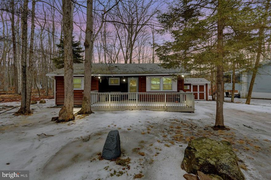 Charming Ranch in the Sought-After Arrowhead Lake Community!
Nestled in the heart of the highly desirable gated community of Arrowhead Lake, this cozy and updated ranch is the perfect addition to your Airbnb/Vrbo portfolio, a weekend getaway or year-round home. Featuring 2 bedrooms and 1full bath, this home boasts an open-concept floor plan that seamlessly blends comfort, and modern updates. Pulling into this charming property, you’re immediately welcomed by a picturesque front porch – an inviting spot to start your day with a warm cup of coffee and take in the peaceful surroundings. Step inside to find a beautifully updated kitchen, complete with cherry cabinets, granite countertops, and stainless-steel appliances, perfect for preparing meals and entertaining guests. The living and dining area flows effortlessly together, creating a warm and inviting space to relax and unwind. The living room has vaulted ceiling, recessed lighting and ceilings fans. The updated full bath features tile flooring, while both bedrooms offer ceiling fans and ample closet space for added convenience. The rear deck leads to a newly installed firepit for those chilly fall evenings or enjoy the private rear yard for those summer BBQ’s. Owners have made many improvements in a short amount od time so you can just unpack your bags: Gutters and Guards (2023) Shed roof & doors replaced (2023), Extended driveway to accommodate multi vehicles, New Shutters, hot water heater (2023) Water tank replace (2023) Crawlspace has been encapsulated & waterproofed, Main beams replaced and leveled, Septic main line replaced (2024) and 10 ft of additional piping replaced (2023) (please see upgrades sheet for additional repairs/improvements) Great location, a short stroll to the Recreation Clubhouse and the Big Lake. Arrowhead Lake community residents enjoy fantastic amenities, including two lakes, multiple pools, a fitness center, clubhouse, playgrounds, and year-round activities. This home is a truly must-see! Don’t miss this opportunity to own a piece of paradise schedule your showing today!