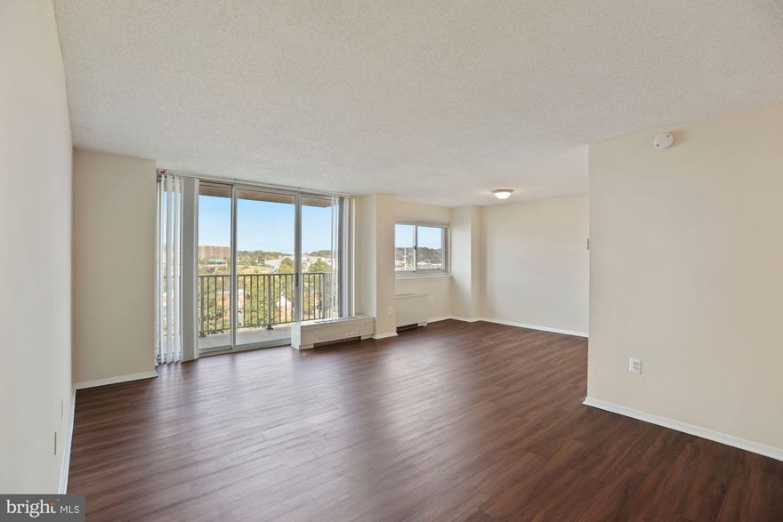 Welcome to the Parc East building, where comfort, convenience, and captivating views come together in this beautifully updated Alexandria condo. Enjoy serene treetop and city vistas from the living and dining areas as well as both bedrooms. The bright, open layout is enhanced by abundant natural light pouring in through a large picture window and sliding glass doors that lead to your private balcony, perfect for taking in views of the Air Force Memorial and even DC’s fireworks.
Inside, you’ll find stylish new wide-plank flooring and an updated kitchen featuring all BRAND NEW APPLIANCES, refreshed cabinetry, and generous countertops. The spacious primary suite easily accommodates a king-size bed and offers a renovated en-suite bathroom complete with a walk-in shower, chic newer vanity, 12"x12" tile floor, and updated lighting. The second bedroom is equally inviting, offering ample space and a large closet. The hall bathroom has also been tastefully updated with a new vanity, matching tile flooring, updated lighting, and a tub/shower combination.
GARAGE PARKING included in price. STORAGE is abundant, including a second oversized walk-in closet off the living room and an additional storage area within the building. The entire condo has been freshly painted in a neutral palette and offers the ease of no carpet throughout.
Parc East residents enjoy a wealth of amenities, including a newly renovated lobby with CONCIERGE SERVICE, a fitness center, swimming pool, tennis courts, basketball court, picnic area, and plenty of outdoor parking on the grounds. Just steps away, a pedestrian bridge leads you to the vibrant Shirlington Village with its outdoor dining, shops, movie theater, and Harris Teeter. You’re also close to Bradlee Shopping Center (1.5 miles), Pentagon City (3.5 miles), and Washington, DC (6 miles). Commuting is a breeze with a Metrobus stop right at the lobby door and quick access to I-395 and the Express Lanes.
Move-in ready, thoughtfully updated, and perfectly located—this is Alexandria living at its best.