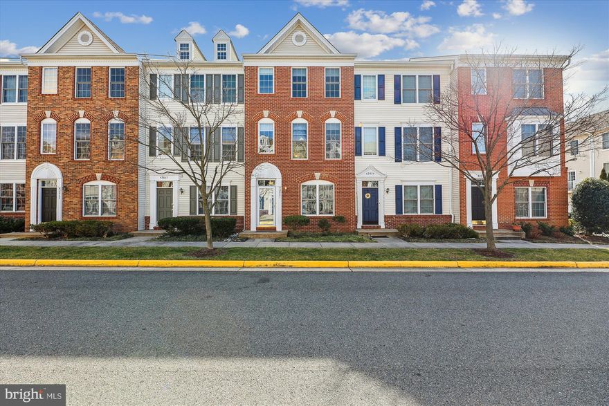 Come see this beautiful 2 car garage townhome featuring 3 bedrooms EACH WITH A FULL En Suite bathroom! The entrance to this lovely home is on the lower level (enter either through the front door or the rear entry garage).  The entry level features a bedroom with an en suite bathroom which may also be used for a home office, guest room or gym!  The middle level is an open concept with high ceilings, a large family room and dining area that is open to the kitchen. You will love all the natural sunlight and the sliding door to the deck off the kitchen!  Upstairs are two large bedrooms, each with a private bathroom and large walk in closet. The carpet has just been replaced (2024) and it looks and shows beautifully! Refrigerator (2018) Microwave (2017).  Community amenities in Amberlea at South Riding include a swimming pool. clubhouse, fitness center, basketball courts, tennis courts, walking and biking trails.