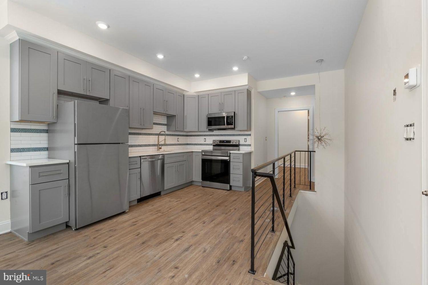 This pristine bi-level two bedroom/two bathroom features recessed lighting, hardwood floors, gorgeous custom tile shower/bath, quartz countertops and stainless steel appliances. The amenities include a bathtub, central air/heat, built-in microwave, dishwasher, garbage disposal and in-unit washer dryer. 509 Gorgas Lane is within walking distance to New Ridge Brewing, Santucci's, Throwbaxx Bar and Grille, the verdant Gorgas Park, Planet Fitness, Wawa and CVS. Additionally, this property is in close proximity to the I76 on-ramp. Renters pay for electricity and a flat 35/mth per person for water. Dogs and cats are welcome with a 350 non-refundable pet cleaning deposit for dogs +35/mth pet rent/cats 250 non-refundable +25/mth pet rent.