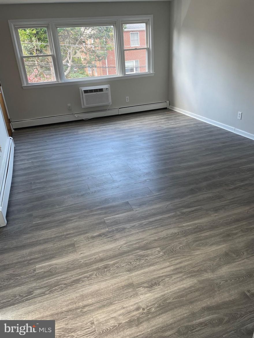 two bedroom apartment 2nd floor, new vinyl floors, kitchen, tile bath.   Available immediately.