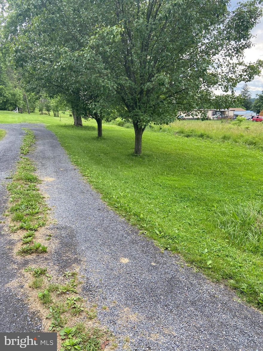 You can own this level building lot in the heart of Ft. Ashby. Utilities available, hook up fee required. There are no restrictions here, bring your mobile home. There are two lots side by side, Hodson St is 0.36 acres, Keller St is 0.23 acres. Tax records have them recorded with different street addresses.