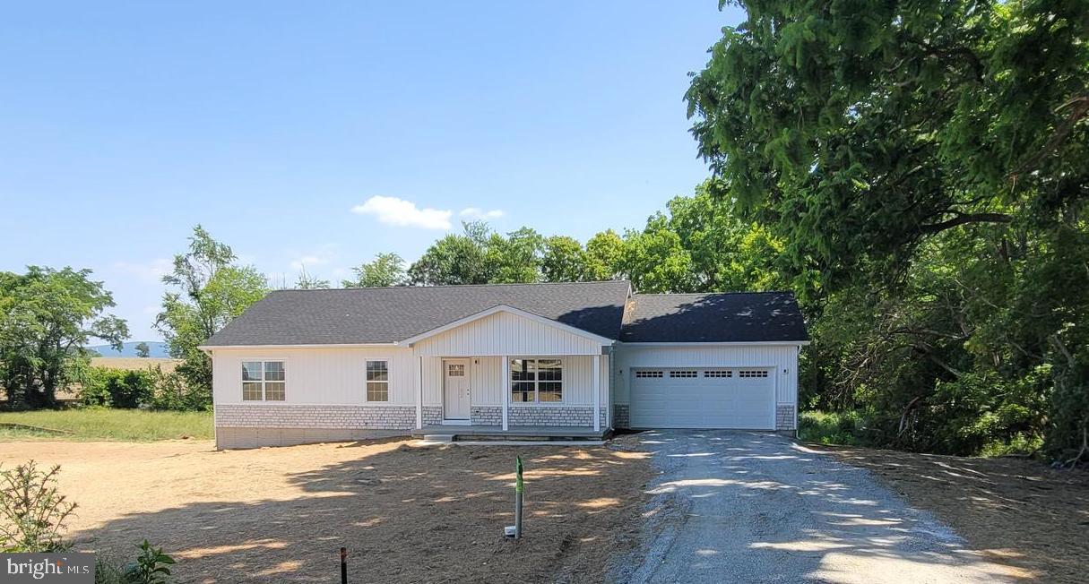 1.50 +/- acre Newly constructed rancher to be built for 2023. March 2023 for construction to being with projected August delivery. Full basement with 2 car garage on the right side. Stainless appliance package, upgraded cabinets and nice finishes throughout. Quality construction at affordable prices make this home a great value. Why rent, when you can buy for less? Great location for VA & MD commuters. Photos are similar construction. Actual home with white siding and tasteful stone water table stone Add $10,000 to sales price for the front porch option. Basement location for washer and dryer.
