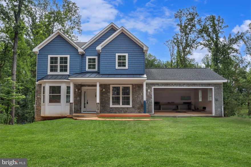 New Construction in The Plains – Delivering Late August! This beautifully crafted new home blends energy efficiency, elegant design, and thoughtful layout—all just minutes from The Plains, Marshall, Rt 17, and I-66. Still time to select colors and upgrades!
The main level features rich oak hardwood floors, 7' oversized doors, square black stair spindles, and a modern electric fireplace in the family room. A main level office with a closet easily serves as a 5th bedroom, paired with a full main level bath for added flexibility. The custom kitchen boasts solid hardwood plywood cabinetry—not composite—premium Blum-brand soft-close drawers, a large pantry, stainless steel appliances, and upgraded granite or quartz counters (with upgrade options available).
Upstairs you'll find hardwood in the hallway, carpeted bedrooms, and luxurious marble in the bathrooms, including matching tub and shower surrounds. Energy efficiency is built in with dual-zone HVAC, upgraded batt and foam insulation, and full attic spray foam.
The fully finished walkout basement adds another bedroom, full bath, rec room, and even a finished utility closet. Craftsman-style curb appeal includes stone-accented columns, a bay window, simulated cedar shake vinyl siding, lifetime architectural shingles, and a freshly seeded yard with painted foundation to match the siding. Note, grass depicted is an artificial rendering showing what the home could look like when property has been seeded after completion of construction