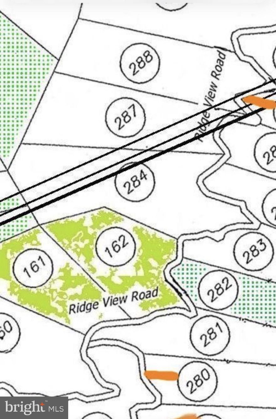 Quiet, expansive,  and perfect to escape the busy city life.  35.10 acres of outdoor adventure.  Excellent hunting and hiking opportunities for the avid outdoor lover. Abundant wildlife on the property. Bring the ATVs!! There are existing roads throughout the property to drive around on and enjoy the scenic mountain views.  10,000 acres of public hunting land nearby only increase the amount of wildlife found here.   ** Trans-Alleghany Line Company agreement provides for 12,000 kw of FREE electric annually to the property owner.