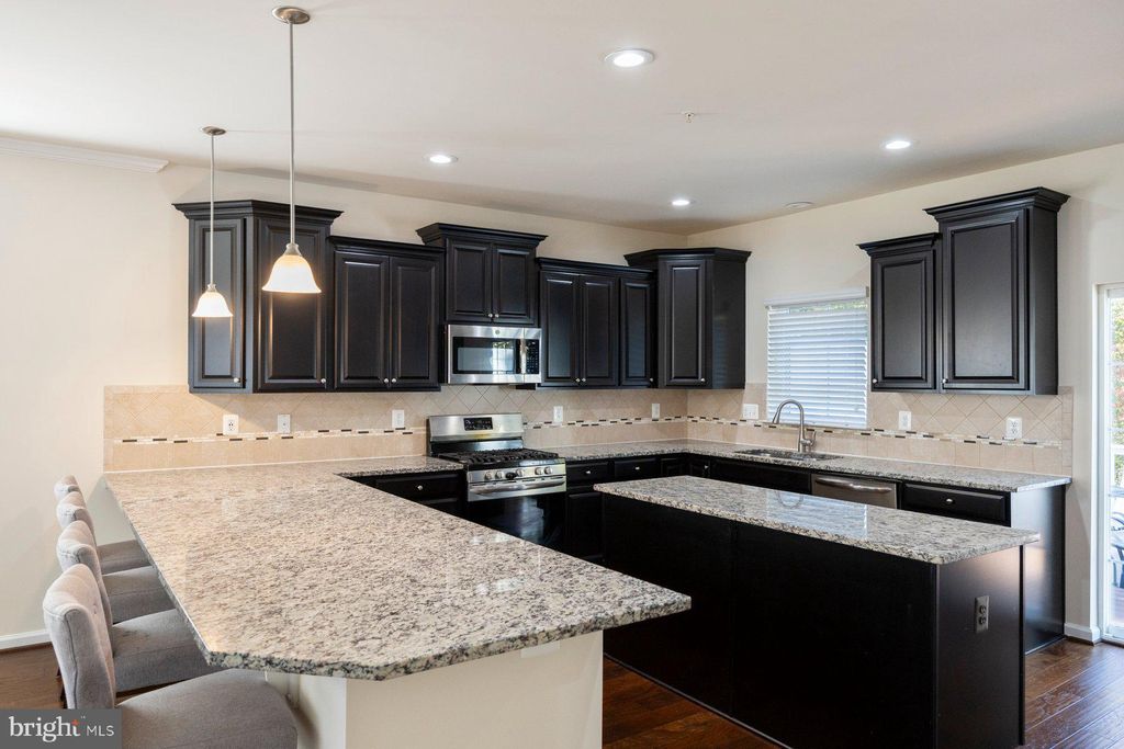 Photo of 1387 Hawthorn Drive, HANOVER, MD 21076 (MLS # MDAA2126324)