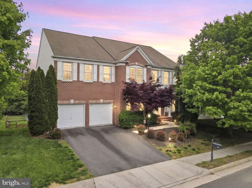 *Just Listed / *First Open House" Sat 05/02 1-4PM & Sun 05/03 1-4PM*  

Welcome to this beautifully maintained home in the highly sought-after Ridings at Blue Spring community. This classic red brick colonial offers 5,634 square feet of thoughtfully designed living space, featuring 5 bedrooms and 4.5 bathrooms.

Situated on a premium lot, the main level welcomes you with a dramatic two-story foyer and an elegant French-door office featuring a bay window. Beyond the formal living and dining rooms and a conveniently located powder room, the home opens to a bright, airy family room with 9-foot ceilings and a gas fireplace—perfect for both everyday living and entertaining. The family room flows seamlessly into a gourmet kitchen complete with a large center island, breakfast bar, and abundant cabinetry, and continues into a generously sized breakfast area overlooking the backyard with direct access to the outdoor deck.  

The upper level features a thoughtfully designed layout with four spacious bedrooms. The expansive primary suite serves as a true retreat, offering a sitting area, a two-sided gas fireplace, a high tray ceiling, a generous walk-in closet, and a well-appointed en-suite bath with dual vanities and a spa-like soaking tub. Each secondary bedroom includes its own closet, and a conveniently located second-floor laundry room enhances everyday living.

The fully finished walkout lower level is filled with natural light and offers direct access to the backyard. Designed for entertaining, it features a movie theater–ready setup and a built-in wet/dry bar. A spacious fifth bedroom on the lower level, complete with a large window, full bathroom, and walk-in closet, provides a perfect private guest en-suite.  

The property also boasts a fully fenced, private, flat backyard—perfect for outdoor entertaining, play, or quiet relaxation. Enjoy outdoor living on the custom-built deck complete with a gazebo and steps leading to the yard, creating an ideal setting for gatherings and everyday enjoyment. Additional highlights include a built-in EV charger in the two-car garage.

Residents of Ridings at Blue Spring enjoy a variety of community amenities, including a clubhouse, outdoor swimming pool, fitness center, tennis courts, basketball court, playgrounds, and scenic walking and jogging paths, along with beautifully maintained common grounds. Ideally located between Fairfax and Loudoun Counties, the home offers exceptional convenience with easy access to major commuter routes, as well as a wide range of shopping, dining, and grocery options. Perfectly situated in the heart of Chantilly, it delivers a well-balanced lifestyle that blends suburban comfort, outdoor recreation, and everyday convenience.