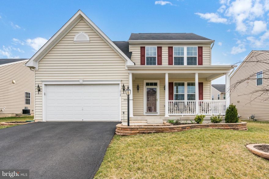 Full of upgrades! This impressive colonial style home shows like a model! Beautiful granite counter tops and SS appliances in the kitchen, gleaming hardwood floors, sunroom, gas fireplace and large master bedroom with a full bath all on the main level. 2 spacious bedrooms and a full bath upstairs. Basement offers an open floor plan, a large room with a closet and full upgraded bath.