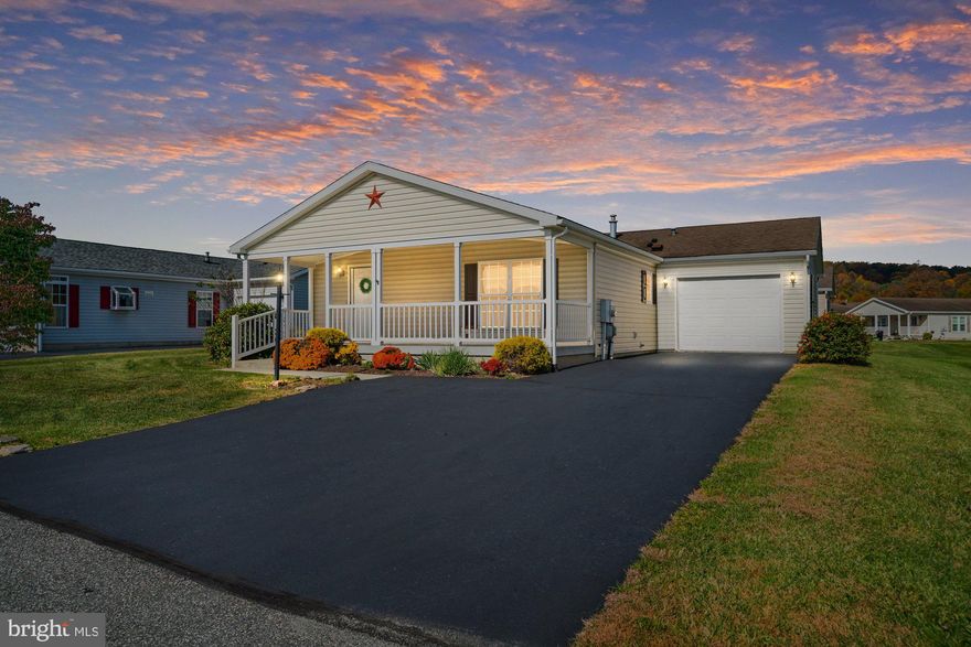 Welcome to Spring Valley Village, the area’s premier 55+ community offering a peaceful setting, beautiful views, and true worry-free living. This well-maintained Charleston model, built in 2009, features 2 bedrooms, 2 full bathrooms, and an open, single-floor layout designed for both comfort and convenience. The inviting covered front porch is the perfect place to enjoy morning coffee or relax at the end of the day while taking in the scenic surroundings. Inside, you’ll find vaulted ceilings and luxury vinyl plank flooring that flows through the living and dining areas, creating a warm and welcoming space for everyday living and entertaining. The kitchen opens to the dining room for easy flow and includes excellent cabinet space. A full laundry room with extra storage leads directly to the one-car garage, which features a garage door opener and attic access. A second attic access is located in the main hallway, providing additional storage options.
The primary bedroom includes a walk-in closet and a private full bath with a walk-in shower. The second bedroom is located near the full hall bath with a traditional tub/shower combination. This home offers modern features, a thoughtful layout, and a low-maintenance lifestyle—all in a beautifully maintained, private community. Spring Valley Village residents enjoy access to a 7,700+ sq. ft. clubhouse with fitness facilities, ballroom, game rooms, and more. The community is pet-friendly and ideally located near Route 100, providing quick access to the Lehigh Valley, Philadelphia, shopping, dining, and healthcare services. Come experience the scenic beauty, tranquility, and lifestyle that make this community so desirable. Schedule your tour today!