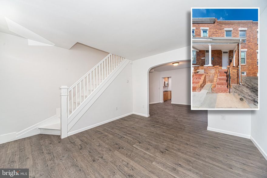 PICTURE PERFECT RENOVATION WITH OFF STREET PARKING!  Open floor plan featuring new wood flooring throughout, a spacious living room, separate dining room, Chef's kitchen with ample cabinet space, upper level with 2 large bedrooms & 1 full bath, full basement for storage, driveway parking & a new roof!