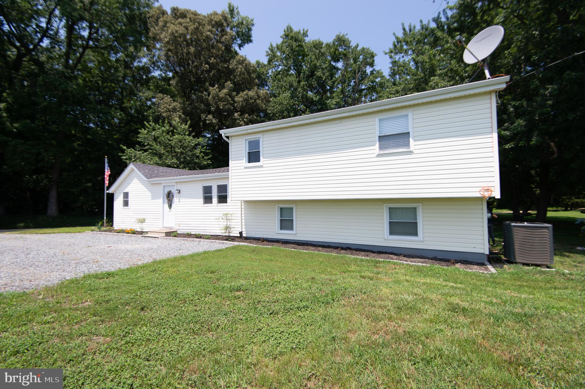 Country location - 3BR, 2BA Home on Private 1± Acre Lot!
This beautifully maintained home offers comfort, updates, and space both inside and out. Enjoy peace of mind with recent upgrades including a new well, septic system, HVAC, roof, and driveway. The home features gleaming wood floors, a bright, updated kitchen and bathrooms, and flexible living spaces – potential for a first-floor bedroom. The ¾ basement provides additional space for a home office, gym, or rec room. Outdoors, you'll love the established garden, mature trees, and partially fenced yard – perfect for pets, play, or entertaining. All this in a convenient yet private location. A must-see!
