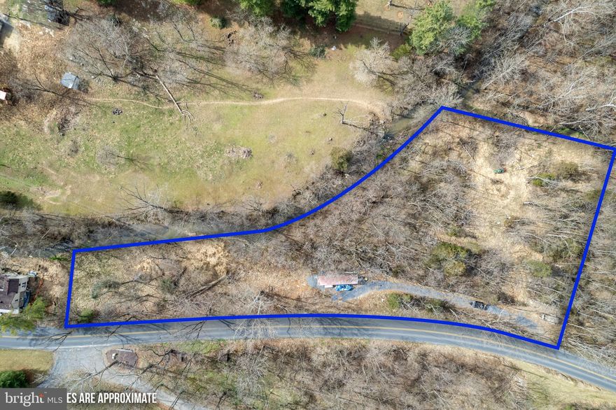 Lovely lot located in Turner Ashby School District. Scenic feel to this property, wooded with some cleared areas. Enjoy the sounds of the creek that runs along the back of the property. You'll appreciate the conveniency but secluded feel of this piece of land.

The bottom part of the property that runs along the creek is in a flood zone (AE).