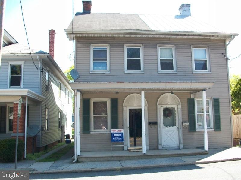 Great 3 Bdrm. Nice original wood work throughout home. Ceramic tile kitchen. 1st floor laundry. Pellet Stove. Wonderful back yard.Perfect for the 1st time home buyer.Home warranty included. Fridge, Oven & AC units stay. Parking-shared garage w/ neighbors. 1 stall comes with purchase of house plus ample parking for 2 cars available on Queen St(less than 1/2 block from home and closer than garage)