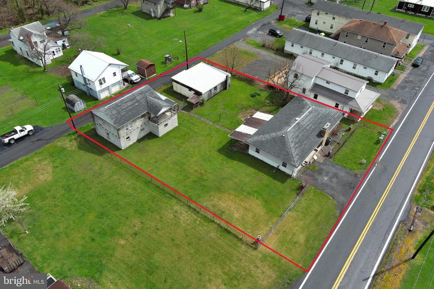 BANG FOR YOUR BUCK......RARE BIRD.....HENS TOOTH......YOU CAN CALL THIS PROPERTY A LOT OF THINGS BUT MOST OF ALL, CALL IT UNIQUE. RANCH STYLE HOME ON HUGE .36 ACRE LOT WITH FENCED YARD, 28X32 GARAGE/WORKSHOP AND 24X34 2 STORY BLOCK BUILDING WITH AN UPDATED 2 BEDROOM APARTMENT ON THE UPPER LEVEL......SPACE....LOTS OF IT.....OVER 5000 SQ FT UNDER ROOF! THE MAIN HOME HAS HAD SEVERAL UPGRADES OVER THE LAST 10 YEARS; NEW ROOF, RE WIRED ELECTRIC, HVAC COMPRESSOR IS ONLY A FEW YEARS OLD, REPLACEMENT WINDOWS AND NEW CARPET IN THE LIVING ROOM. THE APARTMENT IS IN GOOD SHAPE AND THE LOWER LEVEL COULD MAKE ANOTHER APARTMENT. THE SHOP, WELL....IT'S A SHOP BUT HAS BEEN USED AS STORAGE RENTAL SPACE FOR TENANTS. MULTI UNIT MONEY MAKER FOR WANNA BE LANDLORDS $$$$ OR JUST USE AS A SINGLE FAMILY HOME AND PUT YOUR MOTHER IN LAW IN THE APARTMENT AND STILL HAVE PLENTY OF SPACE FOR ALL YOUR HOBBIES. THIS PLACE COULD USE SOME ELBOW GREASE BUT THE VALUE IS THERE.....BEING SOLD "AS IS" SELLER WILL MAKE NO REPAIRS AND THIS HOME IS NOT A CANDIDATE FOR GOVERMENT BACKED LOANS!