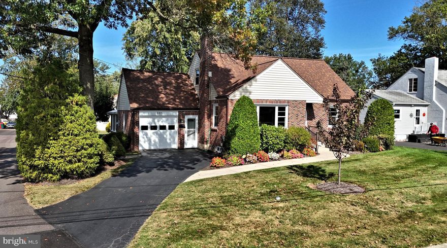 Don't miss out on this meticulously maintained "one of a kind" brick cape cod in the much sought after Souderton Area School District. Incredible curb appeal, professionally landscaped exterior offers a variety of mature shrubs, colorful flowers, shade trees, flower beds, path lights, and an irrigation system.  Need garages  we have two! - One attached and another detached! The easy access, detached,  oversized two car garage(28' X 28') features block construction, repainted 2023, roof-gutter-downspouts-2019,  overhead insulated doors replaced 2020, electric openers, keyless entry, epoxy floors, wood stove heating, extra ceiling lighting,  lots of second floor storage.  Open construction-no columns or supports- gives you the entire area for use.  Store antique cars, your old muscle car, and still have room for exercise equipment, hobby stuff, tools, kids toys, up to you-the space is yours!    Enter through the custom matching storm door and keypad locking front door. All you need to do now is move in and enjoy. This interior is cleaner than clean, you will think you are in a model home.  The first and second floor have been professionally painted (Sept-Oct-25), LVP (installed Sept-Oct-25) in the living room, dining area, kitchen, hall and closet, and first floorbedroom.  Carpet (installed Sept-Oct-25), up the stairs and in both second floor bedrooms.  Cooking will be a breeze in the kitchen featuring; subway tile backsplash, Quartzite countertops, refinished cabinets, stainless steel sink with garbage disposal, Frigidaire stainless steel appliance package (installed 9/25), under cabinet and under peninsula lighting, recessed lighting, and a unique built in spice rack, and ironing board. A walk-in closet with cabinets with soft close drawers, and clothing rack provides additional storage.  You will be absolutely impressed with the full bath-custom granite top vanity, ceramic tile floor with electric radiant heat, walk in shower with ceramic tiled privacy walls with glass panels, glass door, rain shower, shower niches, conveniently located shower controls, built in linen closet, safety grab bars (shower and lavatory), comfort height lavatory, recessed lighting.  Both second floor bedrooms are nice size, and have adequate closet space. The partially finished basement includes an office, family room with a wood burning brick fireplace, and a full bath-walk in shower, shower niche, vanity with subway tile backsplash, tile floor, comfort height lavatory, recessed lighting. The unfinished section of basement has an epoxy floor, outside entrance-epoxy steps to a exterior cellar door, and various mechanicals- Lennox AC (5-22) Lennox furnace (6-08), Bradford electric water heater (2-23), Lancaster water softener (10-23).  Check out the attached one car garage with epoxy floor, insulated garage door, electric opener, keyless entry, and laundry area.  You will spend quality time enjoying the spacious Florida/Sun room (carpet installed Sept-Oct-25)-cathedral ceiling, trapezoid windows, horizontally sliding windows, and a glass sliding door to a paver patio. Last but not least a 28 X 28 detached, block, two car garage-insulated doors, electric openers, keyless entry, epoxy floor, extra overhead lighting, lots of electric outlets, work bench, storage cabinets, pull down steps to second floor storage, and wood stove heating. Just a reminder- amazing garage to store your antique car, your favorite muscle car, family car, kid’s toys, yard tools, detail cars, use as exercise space, convert to game area, or almost any use or hobby you might enjoy, "man cave" or "she shed"! Roof and gutters, replaced,-House (2023), detached garage (2019) Won't be easy finding another garage as nice as this one!  Make your appointment today!  Please review the "Features"  list provided in Bright MLS.