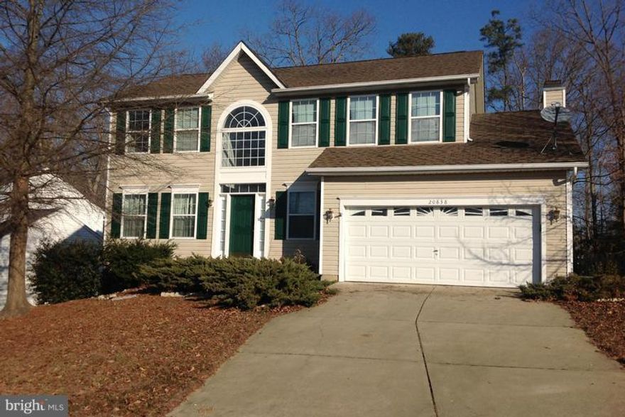 Freshly Painted!Great Colonial home waiting for its new owner. Spacious living room, dining room & eat in kitchen.Enjoy the family room with fireplace off the kitchen with access to the large deck and yard through sliding glass door.3 Large Bedrooms and the convenience of an upper level laundry room.Basement has large rec area. Located 2 miles from PAX River Naval Air Station.