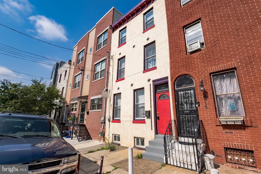 Here's something rare this year - a large good looking and well maintained 1650 ft. rowhouse: move-in condition with 4 actual bedrooms, a real backyard, finished basement, on a great block with still-easy parking, in a community that continues rebuild -all at a reasonable price. 1ST FLOOR: Vestibule entry passes into front room, large, with great ceiling height, natural light and wood floors.  1ST FLOOR MIDDLE is another large room for dining, lounging or working. KITCHEN in rear is spacious with gas cooking, farmhouse sink with disposal, live-edge wood coffee/breakfast bar, plenty of room for storage and view into the yard.  REAR YARD is large with plenty of room for gardening, grilling and guests. 2ND FLOOR FRONT - large bedroom with wood floors, excellent light, and good storage. 2ND Floor hallway bedroom is good side with window view to rear. Full Bath off 2nd Floor Hallway, with custom tile and newer fixtures. 2ND FLOOR REAR is a extra room for storage, office, or a small guest room. 3RD FLOOR: Front Bedroom, wide with great light, and Rear Hallway Bedroom. BASEMENT is finished - a really great space for art/craft, music, office, lounging and play. Many mechanical upgrades and new roofing. This is a special opportunity for someone to take their place in the community in a large house at a great price. Note that the zoning is RM1, permitting Multiunit, and an opportunity to add value for those who wish to redesign.   --THANKS--