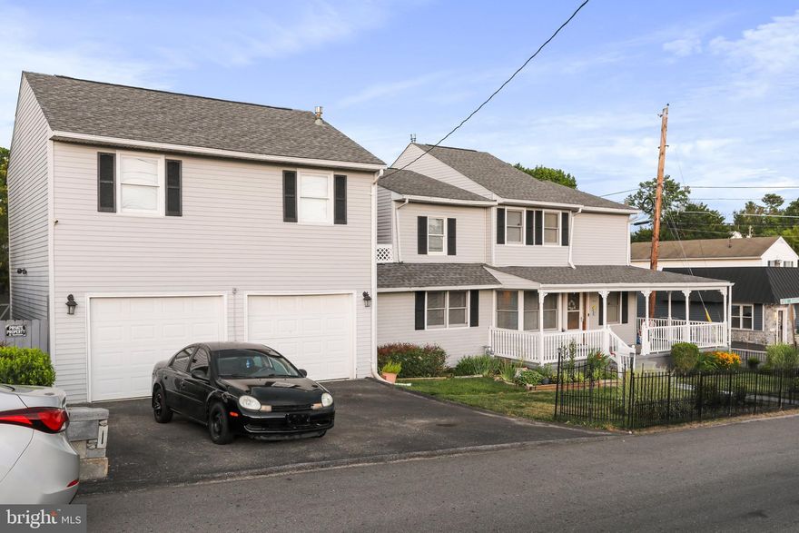 Hurry to this well maintained corner lot Colonial. This home features 6 bedrooms and 4 full baths.  However, you have plenty of options to utilize this unique\Space.When you purchase this home you have the option of  using it to pay for itself, By Air BNB or renting the spacious one bedroom Master /InLaw Suite  resting on top the double car garage space. This suite has a full  Kitchen.  Watch the sunrise as  you sip your morning coffee on the oversized deck.  The main house is also a charmer with its wide wrap around porch and bonus rooms.
It is  never a squeeze to host friends and extended families.  Here you can use the 2 bonus rooms for a home office or den. Great Options  for play area in the partially completed  basement.  This house with its charm will never disappoint for  natural light   from the large bay windows.   Only 3 mins from major Interstate and restaurants.   Roof  and wall to wall carpet is only 4 years old.  New appliances, and  flooring welcomes you to this  Move- In ready  home.