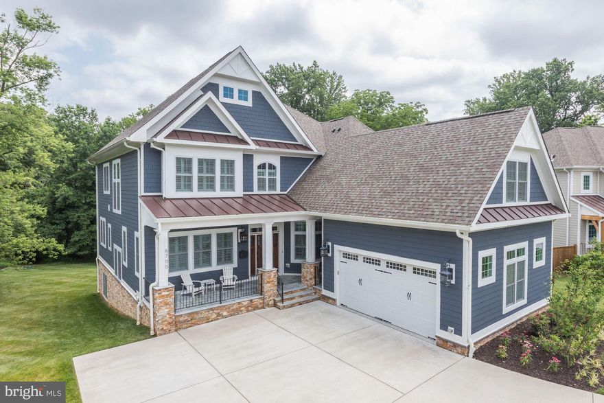 Pristine Newer Constructed Home on Amazing Private Half Acre Lot!  Beautiful 2016 Custom Build with Open Floor Plan is Packed with Options and Upgrades.  Gracious Foyer welcomes you into Main Level Flooded with Light and featuring a Family Room with Gorgeous Views of Mature Trees and Lawn.   Oversized Gas Stone Fireplace has Art Frame TV Screen that will Wow Guest!  Gourmet Kitchen is Packed with Thermador Appliances including Six Burner Gas Cooktop with Griddle and Oversized Fridge/Freezer.  Adjacent Butlers Pantry with Wine Cooler leads to Walk-in Pantry and Mudroom with Family Entrance as well as access to Oversized Garage with Coated Floor, High End Storage System and Wiring for Electric Car.  Dining Room with Custom Woodwork and Living Room are wonderful for entertaining.  Library with Built-ins has Large windows with incredible vistas.  A Screened Porch and Deck with Gas hookup for grill makes for easy Outdoor Living.  Upper Level Is accessed by Stairs with Wall of Windows and has Gleaming Hardwood Floors throughout.  Spacious Master Suite with Sitting Area and Fireplace includes Two Walk-in Closets with Custom Built-Ins. Master Bath with Separate Water Closet, Heated Floors and Dual Vanities.  Three Additional Bedrooms including one Ensuite and a Laundry with Cabinets complete this Private Area.  An Additional Suite is accessed through the Mudroom and would be perfect for In-Laws, Guests or Au-pair.  Lower Level has Full Light and Walks out to Covered Patio from Rec Room with Gas Fireplace and Bar.  Dedicated Exercise Room includes Mirrored Walls and gym Flooring.  Theatre conveys with existing Comfy Viewing Chairs and Screen.  Additional Bedroom is located on this Level as well as a Full Bath.  Conveying with Home is a Control4 Entertainment Hub with 8 Zones!!