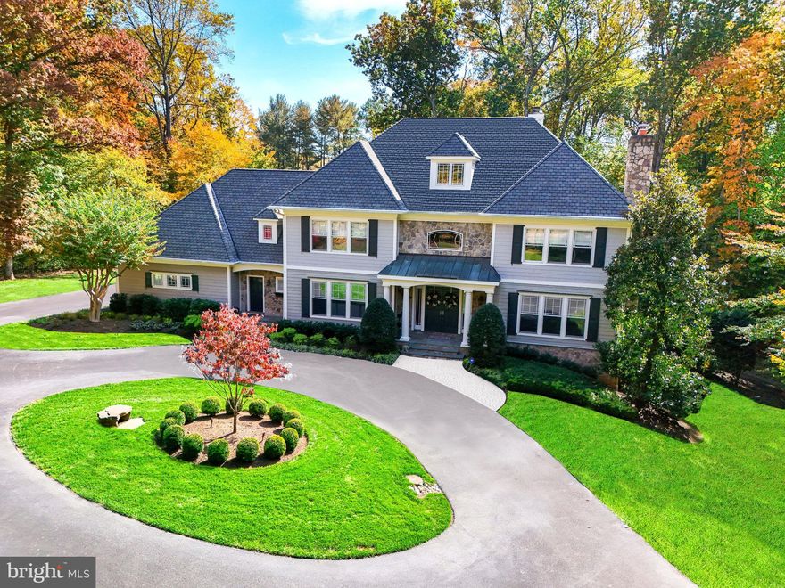 Embrace the splendor of Great Falls in this luxurious estate with 6-bedrooms, 5 full and 3 half bathrooms gracing over five acres of serene landscape. A 3-car garage ensures ample space for vehicles and storage. Recent upgrades include a freshly painted interior and trim, new RH light fixtures, and recessed lighting throughout, enhancing the sophisticated dining space and expansive living areas. The main level combines elegance and comfort, featuring a formal dining room with a new wall feature and exquisite wainscoting molding. The living room, anchored by a welcoming fireplace, is a perfect space for quiet evenings. An office area offers a serene workspace, while the large family room's expansive windows provide stunning views, enhancing the sense of spaciousness and connection to the outdoors. The chef's kitchen has been masterfully renovated with custom-built cabinetry, elegant marble countertops, a high-end Viking cooktop, a Subzero refrigerator, and an inviting wet bar.

The upper level hosts 4 bedrooms plus a renovated primary suite, which is a haven of luxury boasting his and her walk-in closets, a cozy sitting area with a skylight, and an en-suite bathroom featuring a lavish jacuzzi tub, dual separate vanities, and a spacious stand-in shower. Additionally, six out of the eight bathrooms in the home have been renovated.

Entertainment awaits in the newly renovated basement with a sleek 14-foot bar, games area, and home gym. This level also includes a guest suite with a full en-suite bathroom. The basement opens to a patio area with a fire pit, leading to newly expanded and landscaped lawns—over 50 oak trees were removed to enhance the open feel. New landscape lighting, a sprinkler system, a new fence, and landscaping at the Hidden Spring Entrance have been installed. The property’s well water treatment system has been replaced, and all outdoor pavers and the deck have been power-washed and re-stained. In the garage, new shelving has been installed for additional storage. Dominion buried power lines ensure uninterrupted power, making a generator unnecessary.

This home’s prime location in Great Falls, bordering McLean, affords unparalleled convenience to the vibrant heart of downtown McLean, the essential 495, Dulles Access Road, the bustling Tysons, and the Silver Line Metro, inviting relaxation amid Virginia's natural beauty.