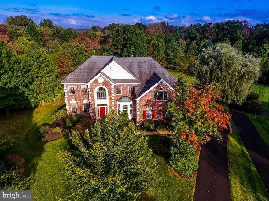 This stunning home in the ever-popular & desirable Talamore Country Club is the one! Located at the end of the private cul de sac of the most sought-after street in Talamore, 1001 Glendevon is set far back from the street on a whopping .75 acre lot, with a private pond & open space behind it! Even the driveway is massive, and the privacy afforded you as the new owner is palpable! Survey the open space behind you- serene. This home just overflows with it! Walk into the huge foyer, you'll be enveloped by the sheer grandeur of this entrance - with gorgeous wood floors, 18' ceilings, crown molding, easy access to living room and dining room, the natural light just bathes it beautifully. Look left and you'll see the formal living room - more wood flooring, plenty of room for formal entertaining, & beautiful four-window bump-out. Look right to the dining room - chair rail, a large bump-out window and the same gorgeous hardwood flooring (throughout the first floor). These rooms both have 9' ceilings as well. Head back toward the great room - you'll pass a well-located private office with wall to wall carpeting and a double window looking out to the back - more soaring 18' ceilings, double skylights, a HUGE double-sized gas fireplace with marble hearth & surrounds and a great view of the backyard! The kitchen - an incredible 28x13 feet, includes a 13x9 eat-in breakfast room! The kitchen has BRAND NEW Frigidaire Gallery Stainless Steel appliances, all white cabinetry, granite countertop and tile backsplash. Room for EVERYTHING you need - plenty of space if you like to cook! Completing the first floor - a laundry room & a huge oversized garage! Upstairs there are four large bedrooms - the master is a whopping 27x24 which includes a beautiful 12x11 sitting room (currently a gym!). Additionally you'll love the tray ceiling, gleaming wood floors, ceiling fan, the large ensuite complete with jetted tub & stall shower, and the queen-sized walk-in closet with lots of built ins! The addl. three bedrooms are well served by the ample hall bath. Make sure you take in the view from the balcony of both the foyer AND great room as you leave! The basement is ready for your finishing touches and is absolutely gigantic! Outside - the back patio looks off toward the private pond and open space. Nature buff? You'll LOVE the flora & fauna - specimen trees, birds, fish, turtles -- the list goes on. Talamore's many amenities include a state of the art NEW gym! Make your appt. now!