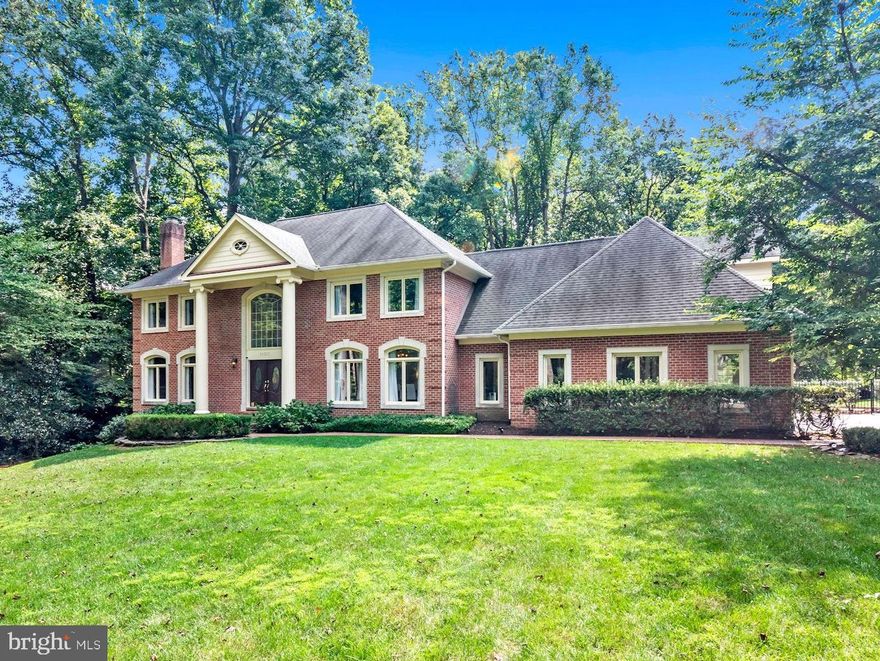 The beautiful Great Falls home that you've been waiting for is now here. This house is the perfect combination of classic elegance with modern features and comfort. Each space will make you feel at home. Entering through an inviting foyer with marble floors to the ample and bright living room with its own fireplace, ideal for conversing.
For a more relaxed setting and ideally placed for entertaining, the family room adjacent to the kitchen is the  environment to enjoy multiple casual activities for the whole family. 
For those special occasions, a separate formal dining room is the perfect space for all festivities and celebrations.
Kitchen and food lovers will enjoy cooking in the beautiful kitchen with its stainless steel top-of-the-line appliances, island and ample countertops to prepare all the food and a breakfast nook for convenient meals.
An office adjacent to the family room provides a space perfect for reading, working, or studying with a view to the beautiful garden and trees.
For convenience to entertain, a powder room is found on this level also.
The laundry room is strategically placed next to the kitchen.
On the second level, the main bedroom with two large closets and a spa-like bathroom will welcome you as you come upstairs. Two additional ensuite large bedrooms, along with two other bedrooms and a fourth bathroom complete this level. The fourth bedroom was converted into a large walk-in closet with an island for shoes and jewelry. This room can be easily reverted to a bedroom.
The basement provides additional space for entertaining and recreational activities. There is currently a room being used as exercise room and a TV room. An extra wet bar allows for food and drinks to be stored and served downstairs.  Two large storage rooms can be found at this level. 
When you step outside of the house you will be just as amazed as you are inside. There is a large deck outside the kitchen where you can enjoy al fresco dining. 
For the summer days, you'll have your own private pool! 
There is also a shed to storage all gardening tools.
A 3-car garage is located on the back of the house and there is a long driveway for when your guests come visit.
For nature and garden lovers, there is plenty of space to sit outside and enjoy all seasons on a 1.75 acre lot.