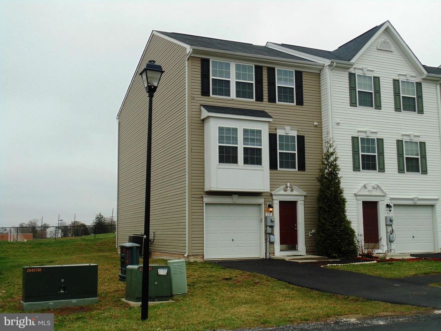 End Unit TH in Manor Park completely renovated top to bottom! New hardwood, ceramic, appliances, fixtures, lighting, paint etc.. All 3 levels 8 ft. extension. Finished basement with ceramic floors, walkout and half bath. 2100 sq ft better then builder new!garage w/auto opener. Master suite with bumpout, walk in closet and luxury bath with separate soaking tub. Hurry today!