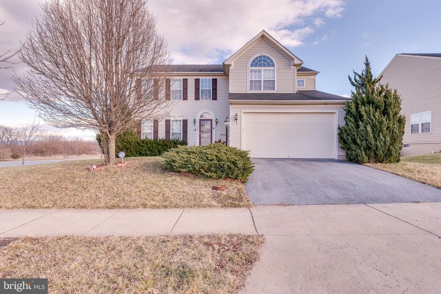 This large colonial bedroom has the space your family needs with great commuting times to VA and MD. The main level features a large, kitchen adjacent dining room. Your gourmet kitchen features stainless appliances, Corian countertops, and large island. It's open to your breakfast nook with decorative fixture and deck access. Beyond this is the large living room. Features recessed lighting and a gas fireplace for these cold winter nights. Off of the living room you have a nice study. This would make a great home office or playroom. The main level also includes a nice powder room and large laundry room with ample storage. Upstairs you have 3 generously sized bedrooms with great closet space. The hall bath features Wainscott detail and tub/shower combo. The master bedroom is quite spacious and includes vaulted ceiling and beautiful arched window. Your suite is completed by the luxury ensuite bathroom and walk-in closet. The lower level is finished into a large rec room. There is a full bath with walk-in shower on this level as well. A large unfinished room works great as a safe storage space. Outside you have a huge deck off the breakfast room. This is the perfect spot to enjoy the sun and grill out. Below the pergola detail is a nice patio to enjoy the outdoors in the shade. Beyond this is a flat, lush yard. This amazing home sits a coveted corner lot in a well established neighborhood. Don't wait on this one! Give us a call and schedule your private showing today!