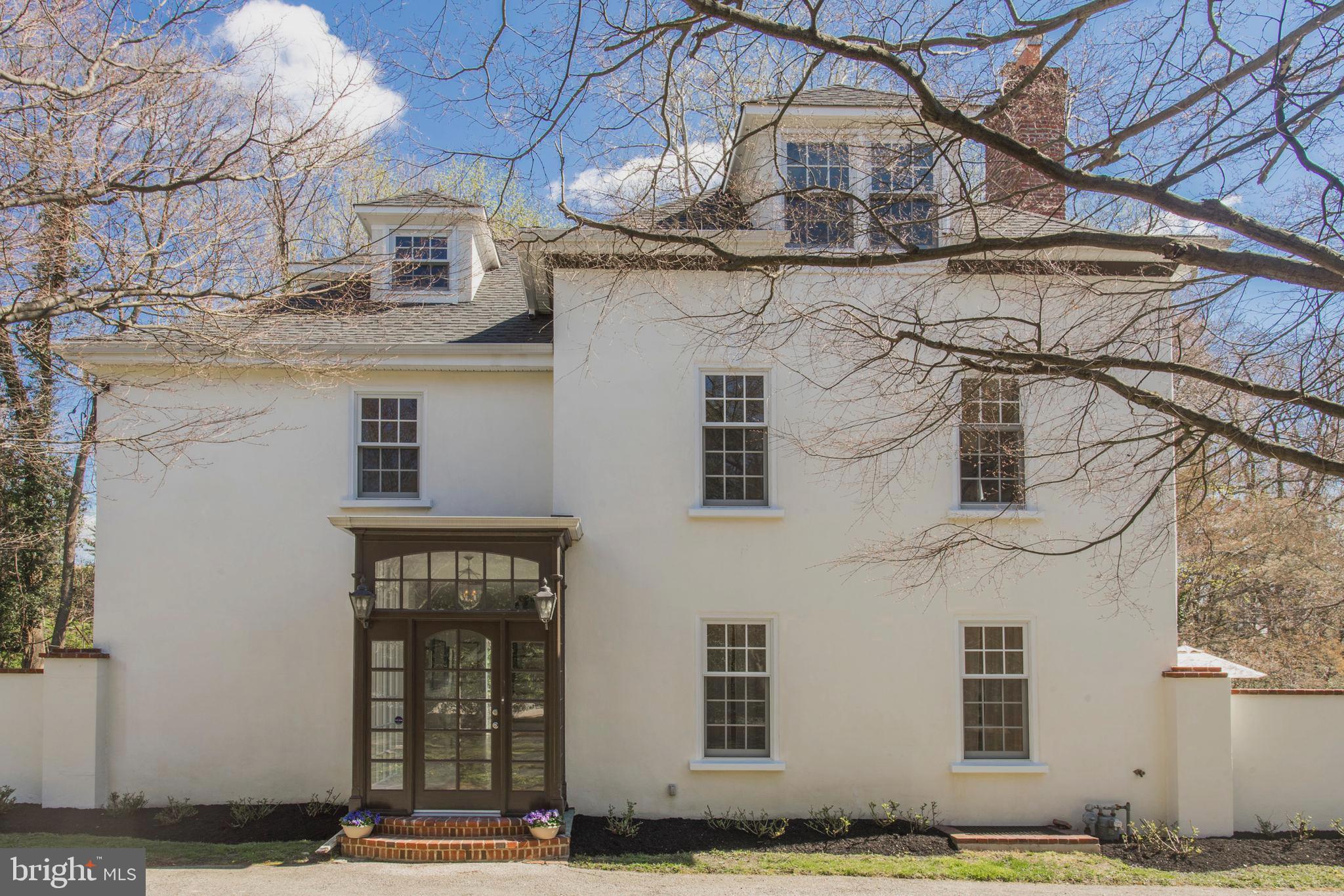 Simply Gorgeous Walter Durham Treasure! A home of this design & location does not come on the market often. Stunning Architectural Design, Welcoming & Peaceful Setting truly describe this special home. Located on a quiet Cul-de-Sac in the Heart of Haverford, this property offers an Open & Airy Floor-plan with attention to detail. The Main Level features a Transom Paned, Brick Chevron Entrance Offering incredible light; Full Front To Back Walk-through Hallway w/incredible views of the back property afforded by unique Floor to Ceiling Window; a Formal Living Room w/ Original Marble Fireplace (Gas) flanked by Two Full Windowed Doors leading to Gorgeous Flag Stone Patio; Living Room opens to Formal Dining Room (currently used as a Family Room) also with Full Window Door Leading to Patio; Oversized Walk-through Coat Closet with Powder Room featuring Pocket Door, Marble Finishes and Spacious Design; the Gourmet Kitchen provides GE Profile Refrigerator, Thermador Wall Oven, GE Profile Microwave, Miele Dishwasher, Lighted Glass Cabinetry, Marble Backsplash, Wood Mode Custom Cabinetry throughout; Open to the Kitchen resides a warm & inviting Family Room/Dining Area with an Abundance of Light & French Doors to Paver Patio for Entertaining & Summer Dining; a Juliette Balcony overlooking the back open space is not to be missed and completes this incredible space. The Second Level Offers a Full Master Suite w/Bedroom with Juliette Balcony overlooking Patio, Full Bath with Frameless Shower and Soaking Tub & Vanity, Dressing Room w/Walk-in Closet; Two additional Hall Bedrooms- one with Juliette Balcony overlooking back yard, with Corner exposures and Jack & Jill Bath provides elegant living space for all. The Third Level can be used as a Second Master Suite or Guest Suite featuring an Oversized full Walk-in Closet, Full Bedroom with Corner Exposure, Full Bath with Frameless Shower & Stunning Tile D cor, plentiful Storage as well. The Lower Walk-out Level offers a Full Gym with Bath, Laundry, Bedroom with Full Bath, Cedar Closet and Storage Galore, New Marvin Windows Throughout ..Too many fabulous features to mention. A European Style Exterior with Two Garage spaces and Two Sun Drenched Patios complete this Incredible Property! Just steps to Haverford Square, Suburban Square, the R5 and so much more!