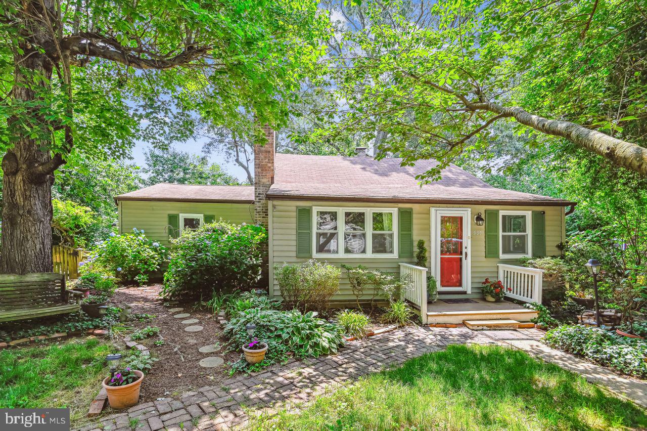 Adorable cottage located in the heart of Severna Park with water access available through the voluntary community association. This home is a nature lovers dream with a floorpan that allows for ease of entertaining and flows straight out to the sunroom and spacious outdoor decking. Three bedrooms each have ample closet space. A cozy living room is anchored by the wood burning fireplace and a bonus den allows for a home office or extra sitting room. The ground floor laundry room is a convenient feature and the unfinished basement provides easy access extra storage space. The gated community water access offers community waterfront, pier with boat slips, kayak rack and playground. Come make this home your own!