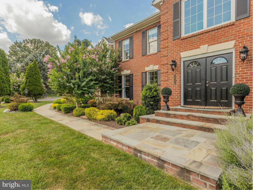 Stunning home inside & out! From 2-story foyer to amazing lot & view, an open floor plan offers a spacious kitchen opening to family room w/fireplace & access to sun room! Main level BR or use as sunny office! Expansive master suite w/sitting area, walk-ins & large bath w/deep-soaking jetted tub. MBA w/new lighting, mirrors & dual vanities! Walk-out LL offers rec room, play area & huge storage!