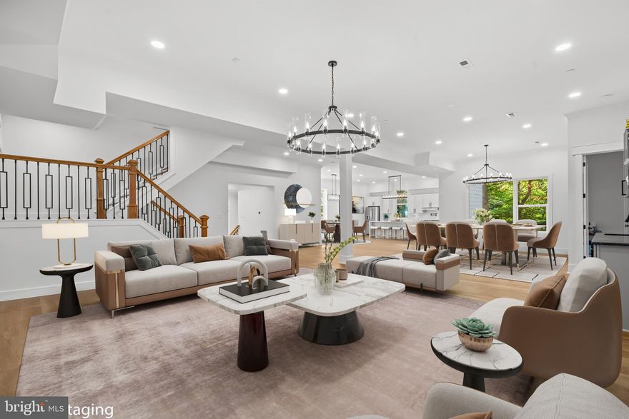 Soaring 11-foot ceilings and dramatic walls of glass bathe this exceptional Mid-Century Modern home in natural light, with stunning, unobstructed views of Sligo Creek from every room and multiple private balconies. Perched on over half an acre above the peaceful creek, this Takoma Park retreat perfectly blends modern luxury with timeless design—creating a rare sense of openness and harmony with nature.

Enjoy true park-like living with tree-framed vistas in every direction and direct access to the scenic trails of Sligo Creek Park. A two-car garage with EV charger, expansive driveway, and additional parking pad ensure both convenience and sophistication.

Inside, a striking foyer with floor-to-ceiling windows opens to tiered decks overlooking the creek—an unforgettable first impression. The main level is thoughtfully designed for both everyday living and entertaining, featuring two bedrooms, two full baths, and a chef’s kitchen with a waterfall island, walk-in pantry, and beverage bar. Two serene porches extend the living space outdoors, while a main-level laundry hookup adds ease and functionality.

Upstairs, the primary suite is a private sanctuary with vaulted ceilings, a spacious dressing room, and a spa-inspired bath. Three additional bedrooms share a stylish Jack-and-Jill bath, complemented by a second laundry area for added convenience. Multiple upper-level decks enhance the indoor-outdoor lifestyle, offering peaceful, private spaces to relax and take in the views. The conditioned lower level provides ample storage or the potential to create additional finished living space tailored to your needs.

Located on a charming sidewalk-lined street, you’re just minutes from Takoma Park favorites like the Co-Op, Takoma Bev Co, the local Farmer’s Market, and Cielo Rojo. Surrounded by lush parks, vibrant community events, and neighborhood charm, this one-of-a-kind home offers the perfect balance of style, comfort, and location.

Mortgage savings opportunities may be available for qualified buyers.