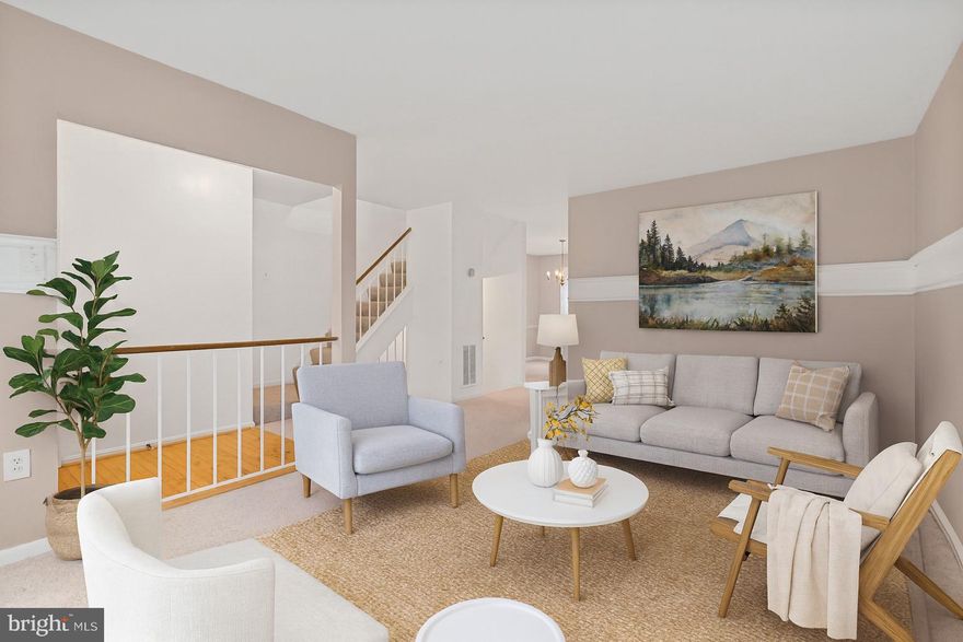 Updated three-level townhome offering 1,662 sq ft of living space in a prime Fairfax location near I-66, Route 50, Vienna Metro, George Mason University, and Mosaic District. The main level features a bright open layout with hardwood floors, a dining area with chair-rail detail, and an eat-in kitchen with stainless-steel appliances, modern backsplash, and breakfast nook overlooking the fenced backyard. Upstairs, the primary suite includes dual closets and a private bath, with two additional bedrooms and a full hall bath. The finished lower level provides a large recreation room, half bath, laundry, and walk-out access to the backyard. Community amenities include playgrounds, tennis courts, and open green space. Two assigned parking spaces, energy-efficient windows, and central HVAC complete this well-located Fairfax rental near shopping, dining, and transit.