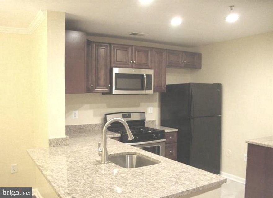 Considered Germantown. 2 Master Suites, 2 Bath Condo in sought after Brookstone.  Open Floor Plan.  Kitchen with Upgraded Cabinetry and Granite Countertops. 
This condo comes with one assigned parking space and plenty of unassigned/guest parking spaces. Enter by Patio to Courtyard or Use Stairs from the Front. Laundry Room w/Full Size Washer & Dryer.  Amenities include a Pool, Tennis Courts, Playground & Jogging Trails! Off Richter Farm Rd & Great Seneca.  Walking Distance to Northwest High School.   Minutes from I-270, the MARC Train, Restaurants, Shopping, &  Transportation. Rent includes HOA fees & water. No pets, No Smokers .  Rent includes HOA fees, trash removal, water, and snow removal.