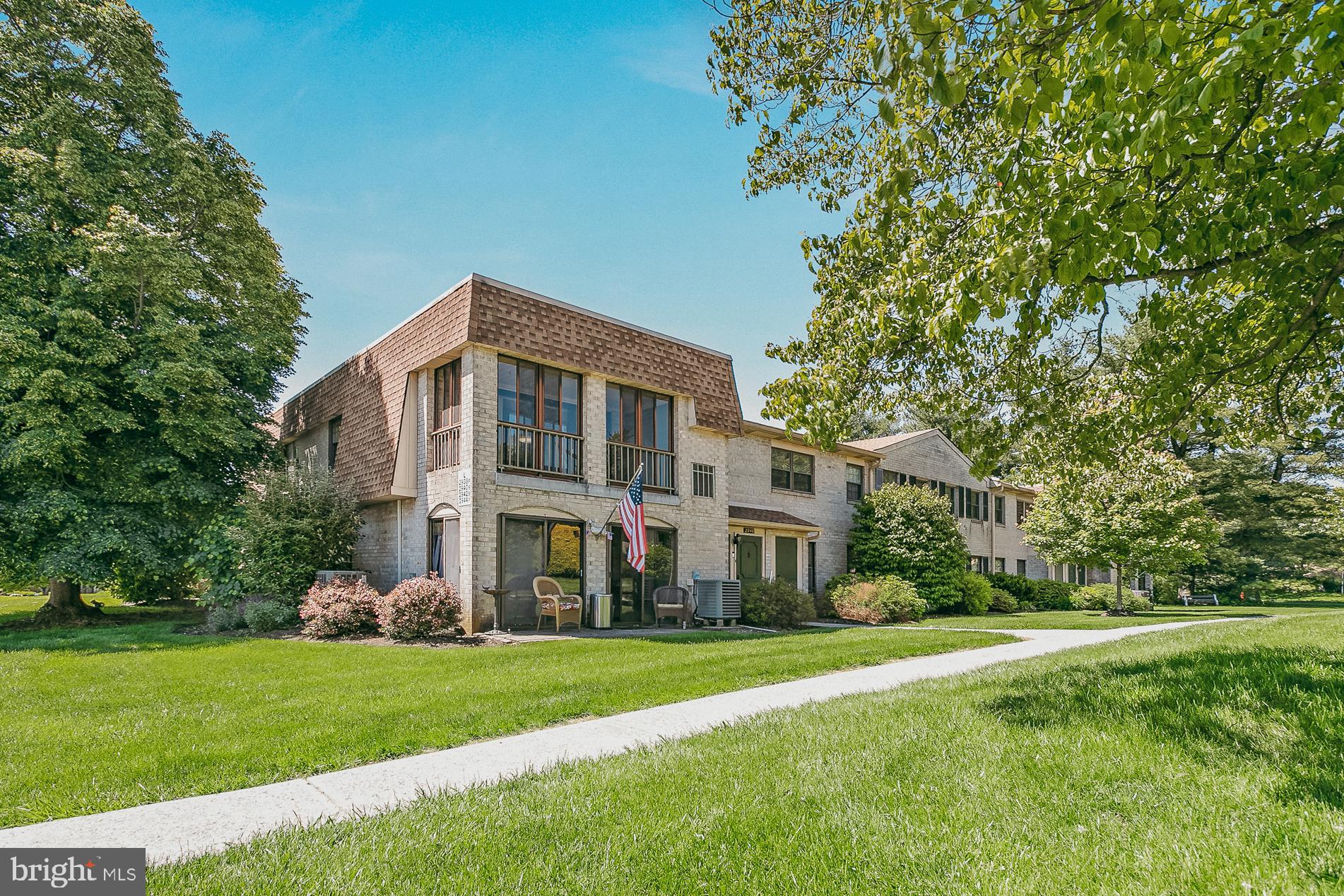 Highest and Best - Due by Thursday, June 5th by 5pm // Discover this exceptional 2 bedroom, 2 full bathroom second floor corner-unit condo in the Fairways at Brookside in the East Penn School District. This easy-living home feels fresh and open with plenty of natural light. This condo comes with Central Air and a relaxing glassed-in porch with window screens: perfect for houseplants, peaceful morning coffee, or a gorgeous spot to read. Roof, grass cutting, garbage & recycling, exterior maintenance & snow removal is taken care of for you; just enjoy living in this peaceful community & access to the pool, clubhouse, tennis & pickleball courts. The home comes with nearby off-street parking and a convenient first floor closet next to the front door. This home also provides a washer and a dryer next to the bedrooms, a full concept kitchen & pantry, and a walk-in closet in the primary bedroom. Don't miss the chance to make 2940 Aronimink Pl your next home.