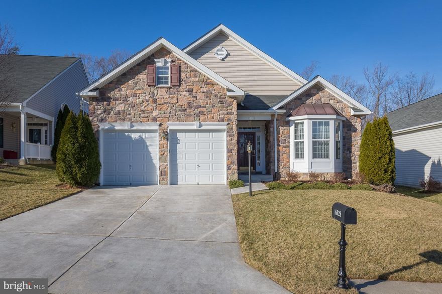 VERY NICE STONE FRONT SOUGHT AFTER SANIBEL MODEL ON NICE LOT * 55+ ACTIVE ADULT COMM. FORMAL LR. & DR. LG. KIT.W/CORIAN, CHERRY CABS. & SPACIOUS PANTRY. LG. BREAKFAST RM. COZY FAM.RM.W/GAS FP. SUNROOM W/CATH. CEILING & W/O TO PRIVATE PAVER PATIO BACKING TO TREES. MBR W/TREY CEILING. LUXURY MBA W/SOAKING TUB & SEP. SHOWER. ABOVE GAR.- FIN. RM. W/TONS OF STORAGE & ACCESS TO FURNACE. HSA WARRANTY