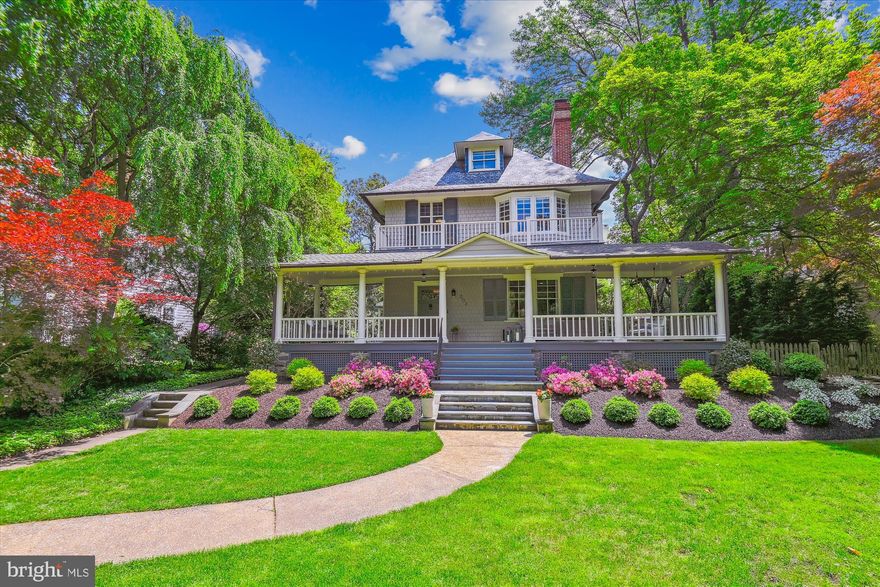 Perfectly situated on one of Roland Park’s most prestigious streets, 303 Goodwood Gardens is meticulous in every respect. The recent extensive renovation, overseen by architect Vincent Greene, delivers a vibrant renewal of the interior spaces, timeless in its design and finishes. The picturesque front porch, with its cozy sitting areas and soothing porch swing, signals the elegant details inside and provides a gracious welcome to the impressive entry hall. Prepare to be captivated by the high ceilings, bejeweled fixtures, lead glass windows and so much light. To the right, the living room invites you to linger, with its built-in bookshelves and warming fireplace. Then flow seamlessly to the stunning centerpiece of the home, the original paneled dining room. The eat-in chef's kitchen, magnificently outfitted to perfection, adjoins the enviable family room, with both opening to the beautifully landscaped terrace and gardens. Completing the main level you will find a perfectly appointed mud room, pantry, and powder room. Moving upstairs, the primary suite provides a further retreat, with its spa-like bath. There are two additional bedrooms, a recently updated hall bath and picture-perfect laundry. Take the gracious staircase to the third floor where you will find a full bath and three more rooms; a light-filled office, with custom built-ins, a media room, and another bedroom. No detail was overlooked in the meticulous addition of an oversized two car garage in 2018. With the highest quality fixtures and finishes throughout and sliding barn doors that open to the side yard, this car enthusiast’s dream space also offers unique options for entertainment and play. Recent updates include: Control4 Smart Home System (2017), New sewer line (2017), New water main (2018), Garage (2018), AC (2021), Porch Roof (2021), Extensive Landscaping (2018 & 2022), Shed (2022). Welcome Home!