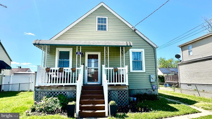 Charming, move-in ready Cape Cod offering low-maintenance living and great potential! Step into a spacious and bright living room that welcomes you home, featuring updated flooring throughout and a comfortable, inviting feel. The main level includes two well-sized bedrooms and a beautifully updated full bath. Enjoy the convenience of an updated kitchen with ample cabinetry and space for a table—perfect for everyday meals. A covered front porch adds even more charm and a perfect spot to relax. A pull-down attic provides easy access for storage and offers an excellent opportunity to be finished or renovated for additional living space. The unfinished basement provides excellent flexibility and is currently being used as additional living space—ideal for a rec room, home gym, or hobby area. Step outside to a partially fenced backyard with low-maintenance vinyl privacy fencing, along with a covered space perfect for outdoor dining and grilling. A standout feature of this property is the oversized two-car garage—perfect not only for parking, but also as an incredible entertaining space. With garage doors opening to both the driveway and backyard, plus a convenient half bath and mini-split system for year-round comfort, it’s ideal for gatherings, hobbies, or game days. This home offers the perfect blend of indoor comfort and outdoor enjoyment. This home offers the perfect combination of comfort, functionality, and future potential.