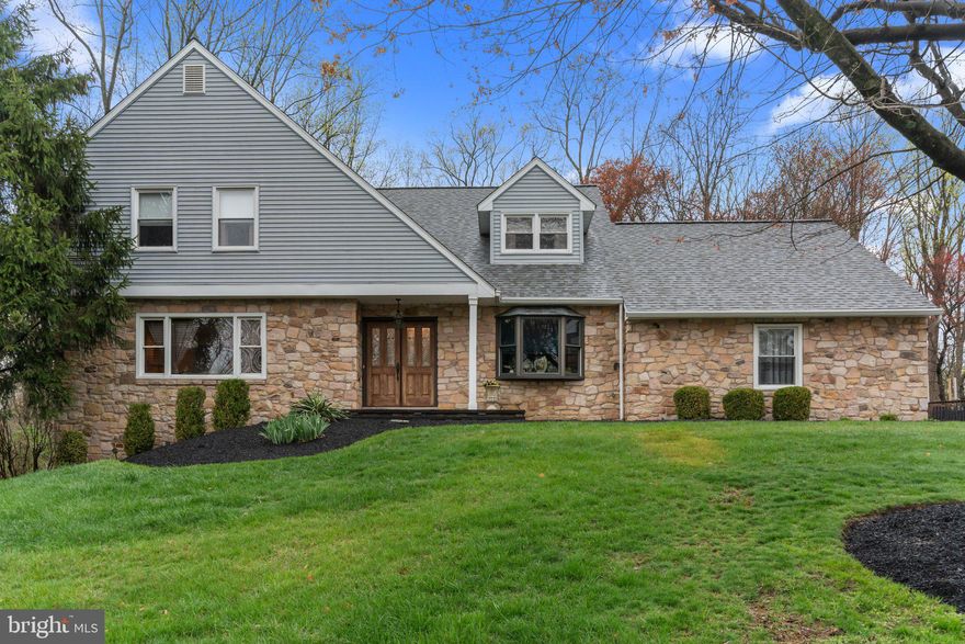 Welcome home to this gorgeous & spacious 4 bedroom home in Yardley!  With versatile living space and modern upgrades throughout, this home offers the perfect combination of functional living with style and comfort. Walk up the updated stone pathway and step inside where you are warmly welcomed by radiant sunshine. The foyer is flanked by your office offering privacy with French doors for seclusion and your cozy living room where you can entertain friends and family in style. The living room flows nicely to your formal dining room complete with crown molding and chair rail trim. Continue down the hallway, with convenient large coat closet, to your eat in kitchen boasting updated custom cabinetry, granite countertops, tile backsplash, large island for ample counter space , stainless steel appliances, built in microwave and dining area with sliding door access to your backyard deck - perfect for indoor/outdoor entertainment! Your spacious and cozy family room is ideally located right off the kitchen and showcases a wood stove fireplace set amongst stone with a wood storage area AND a separate wet bar with wine rack storage, bar for entertaining and recessed lighting. Continue down the hall to the highly sought after mud room with direct access to your backyard and dedicated laundry closet with bonus utility sink. This floor also features a recently updated powder room. Upstairs offers 4 bedrooms all with carpeting and natural light. The luxurious primary bedroom features a separate sitting area, vanity/dressing area, dual closet space and a beautifully updated ensuite full bathroom with soaking tub, stall shower and updated vanity! A full hallway bathroom with tub/shower and linen closet completes this floor. Your fully finished WALKOUT basement offers versatility and is perfect for additional play space, hobby room or even gym! Walkout of your basement to a separate fenced off area that can be used as a dog/animal run, greenhouse area or dedicated play area! The basement comes complete with ample closet space including a cedar closet for all your storage needs AND a powder room for convenience. Step outside to your HUGE fully fenced and tree lined backyard oasis offering a NEW Trex deck (2020) where you can relax and enjoy gatherings with friends and family. The backyard boasts mature landscaping and backs to a serene, tree-filled township open space offering ultimate privacy. This home offers an attached side entry two car garage and a recently expanded and repaved driveway (2022) for ample parking. Other recent updates include NEWER HVAC (2022), gutter guards outfitted on whole house, updated walkway and front porch (2023), newer roof (2018) and updated vinyl siding! Ideally located just minutes from the heart of Lower Makefield Township, including the Yardley-Makefield Library, the community pool, and the beloved Kids Kingdom playground. You'll also enjoy close proximity to charming downtown Yardley Boro, home to a variety of local shops and restaurants. For commuters, the Yardley train station, Trenton-Mercer Airport, and I-295 are all conveniently nearby. Don’t miss your opportunity to see this beautiful home! **Seller is also including a one year home warranty to the future buyer**