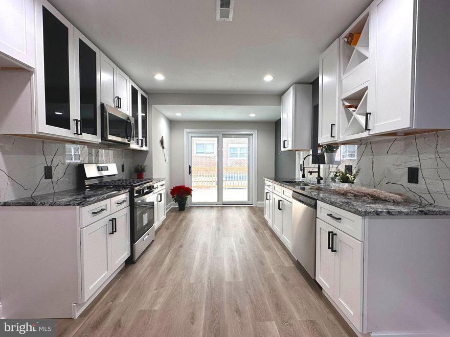 Gorgeous fully remodeled 5 bedroom 3 1/2 bathroom home perfectly located between  Ogontz  ave &  Broad st !!! Enter through the cozy front porch to find an open-layout living and dining area with chair moldings, wall frames, brand new engineering  flooring, recessed lighting and open entrance to the finished basement. The lavish kitchen boasts rich cabinets, granite counter-top, stainless steel appliances  and modern back splash .  Enjoy your family holidays on the huge rear yard deck. The second floor offers a master suite with its own luxurious bath, three additional bedrooms with plenty of sunlight and closet space, and a shared hall bath. All baths feature imported tiles and brand new vanities, tub, and fixtures. The finished basement offers high level quality carpet, additional space for entertaining or relaxing, a separate laundry room, 5th bedroom and 3rd full bathroom. Other key features include brand new efficient water heater, central air HVAC system, brand new  electric service line, new plumbing and electrical systems. Interior updated with an amazing attention to detail and the finest quality, exterior upgraded with new grey color siding and brand new roof with 5 years warranty. This home is a must see! Disclosure: Listing Agent has financial interest. The property are under live video and audio surveillance. All access and showings are recorded and monitored remotely. By entering the property, you give automatic consent to be recorded and monitored with both video and audio. Footage stored off site. All video and audio recordings could be made public.